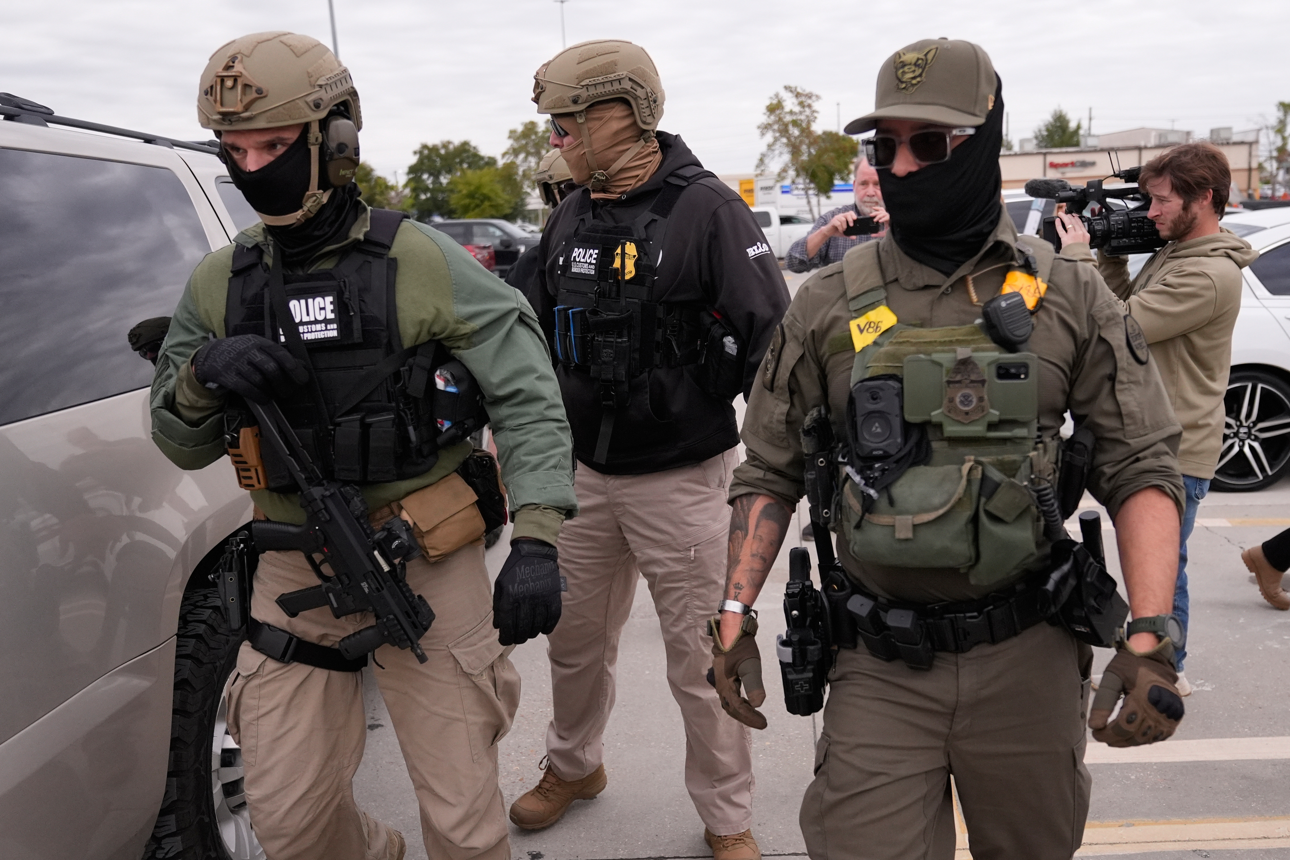 US Border Patrol agents arrive at a Home Depot in Kenner