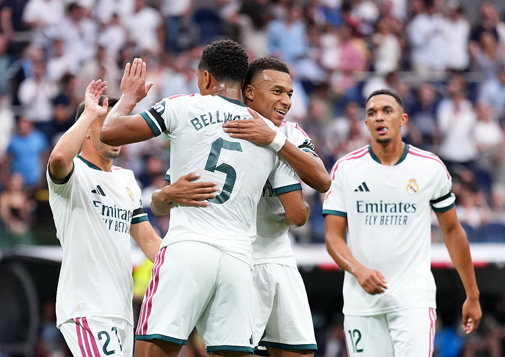 Jude Bellingham and Kylian Mbappe of Real Madrid celebrate after Alfonso Herrero of Malaga scores an own goal