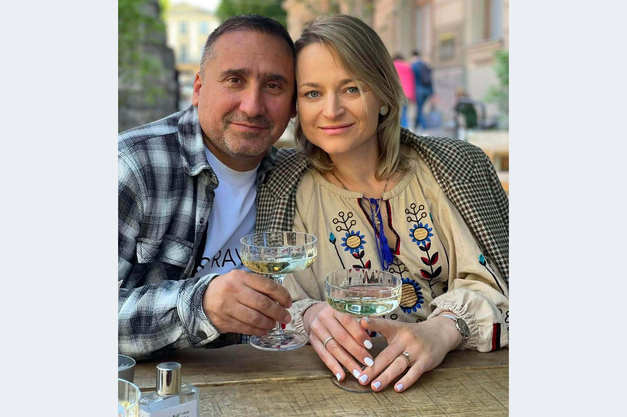 Ihor Solovey, left, and his wife Valentyna Savitska, smile in a photo.