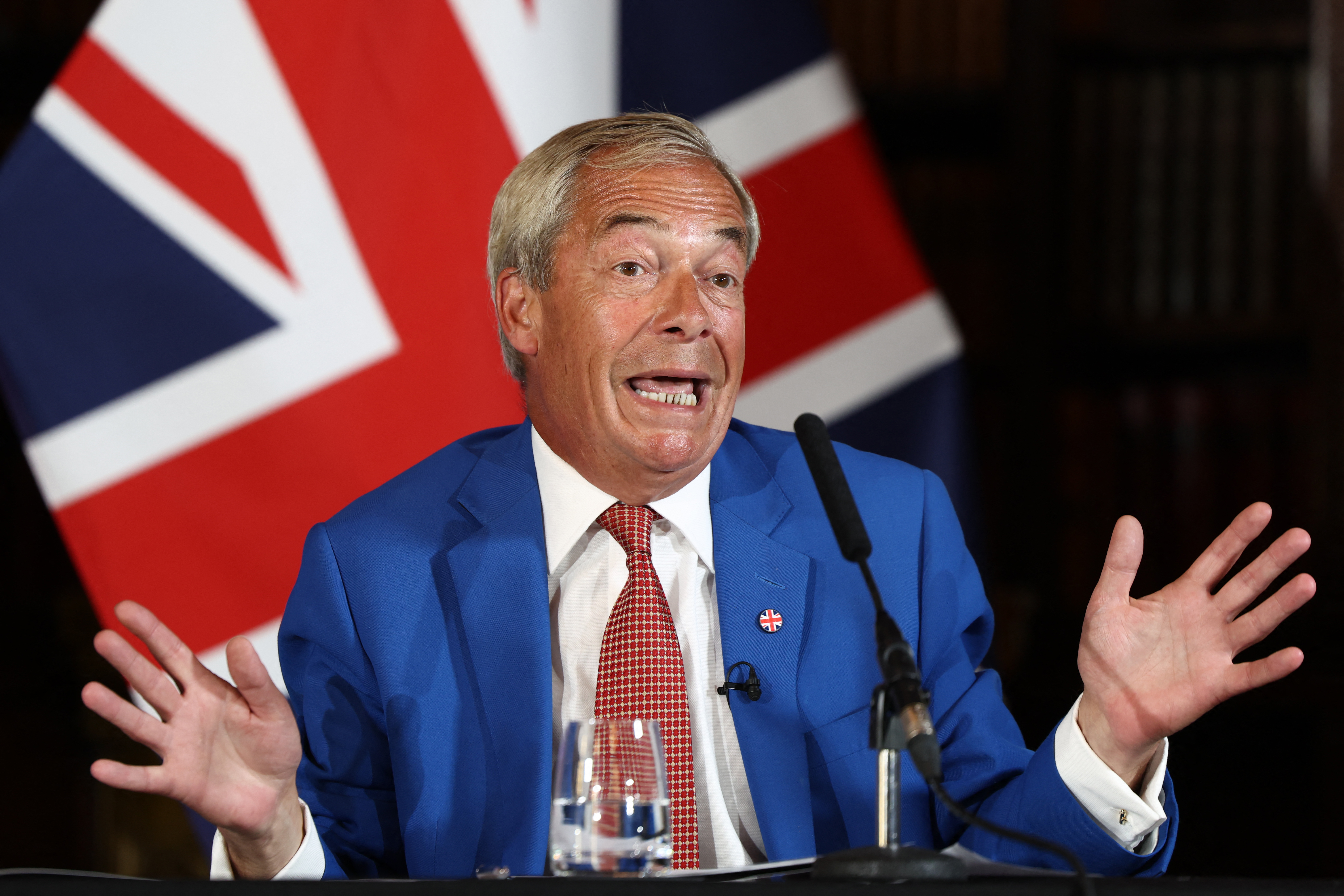 Reform UK leader Nigel Farage speaks during a press conference at a hotel in central London on August 3, 2026. (Photo by Toby Shepheard / AFP)