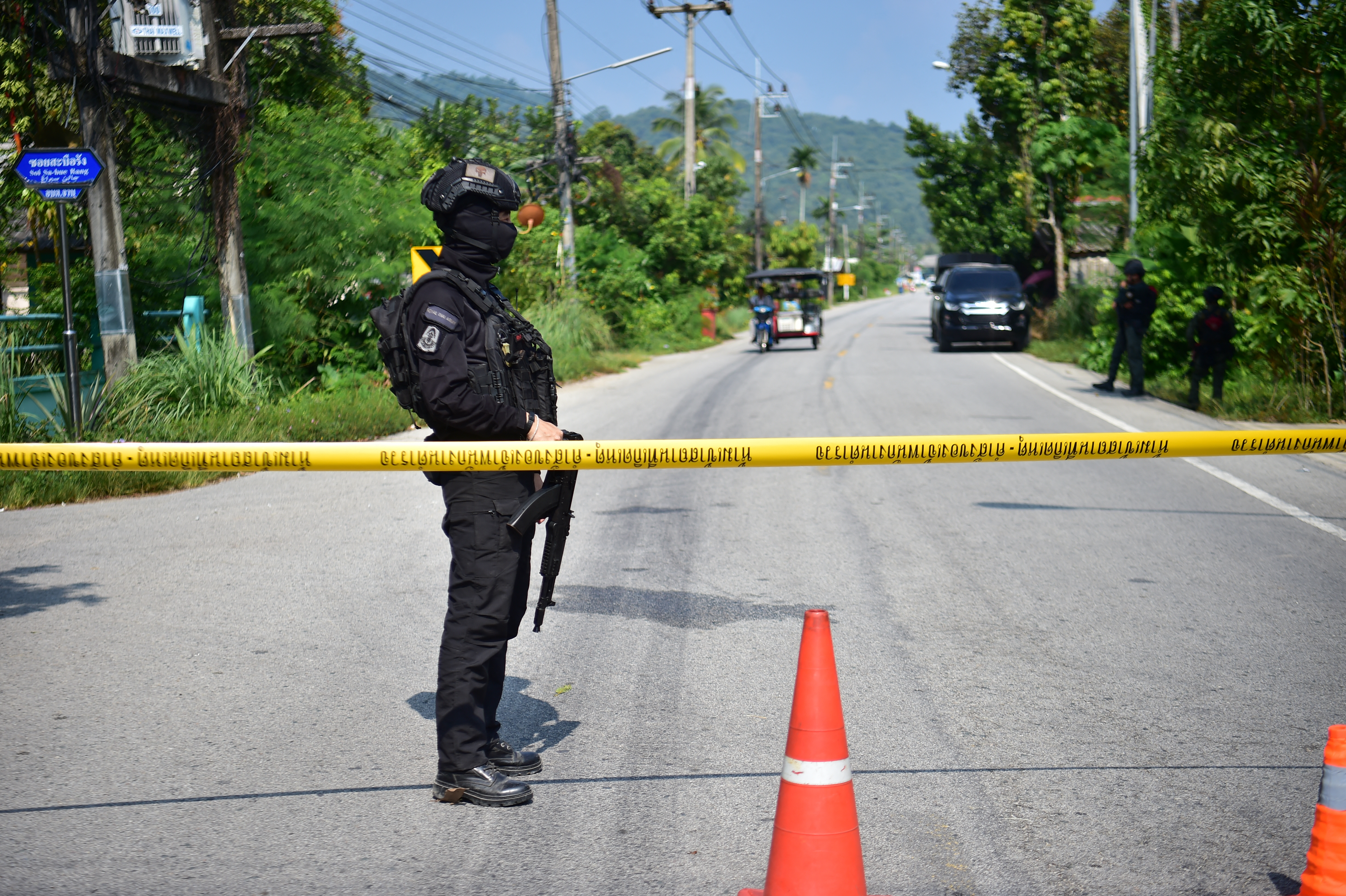 Thai soldiers man a checkpoint in Cho Airong district after an attack