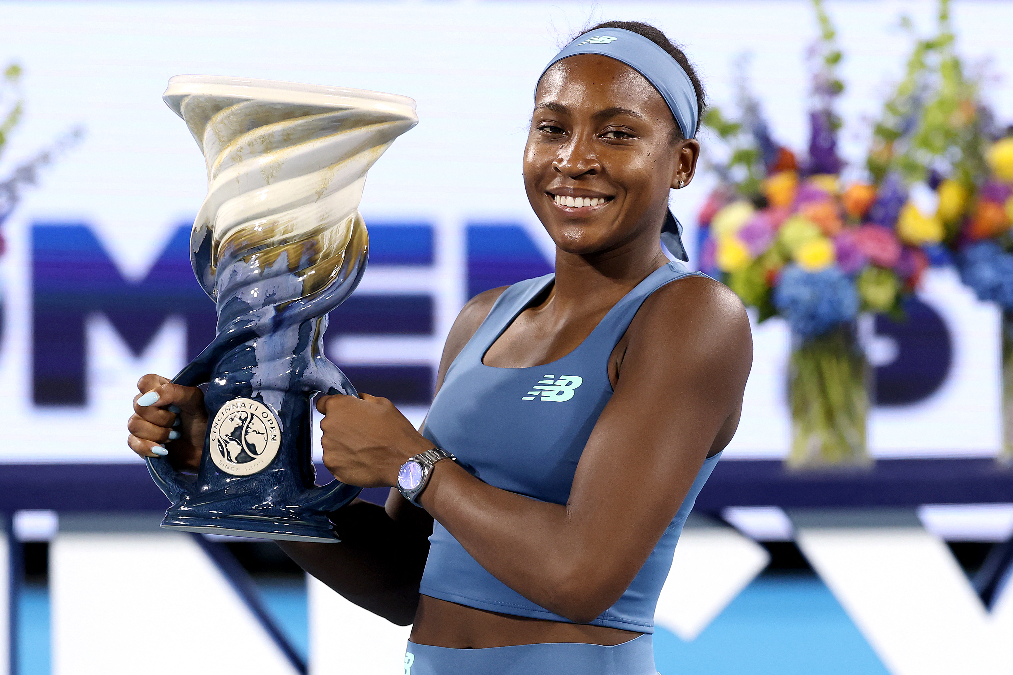 MASON, OHIO - AUGUST 23: Coco Gauff of the United States poses with the Rookwood Cup after defeating Jessica Pegula of the United Staes during the Women's Final on day twelve of the Cincinnati Open at the Lindner Family Tennis Center on August 23, 2026 in Mason, Ohio. Matthew Stockman/Getty Images/AFP (Photo by MATTHEW STOCKMAN / GETTY IMAGES NORTH AMERICA / Getty Images via AFP)