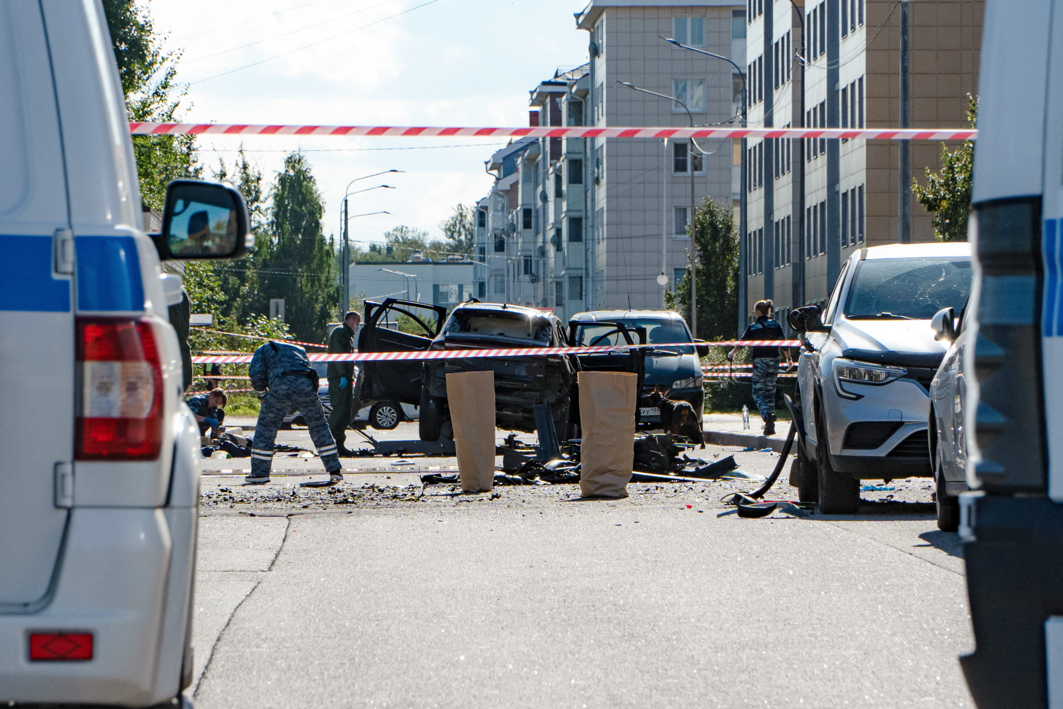 Investigators work at the scene of a car explosion in Saint Petersburg on August 27, 2026.