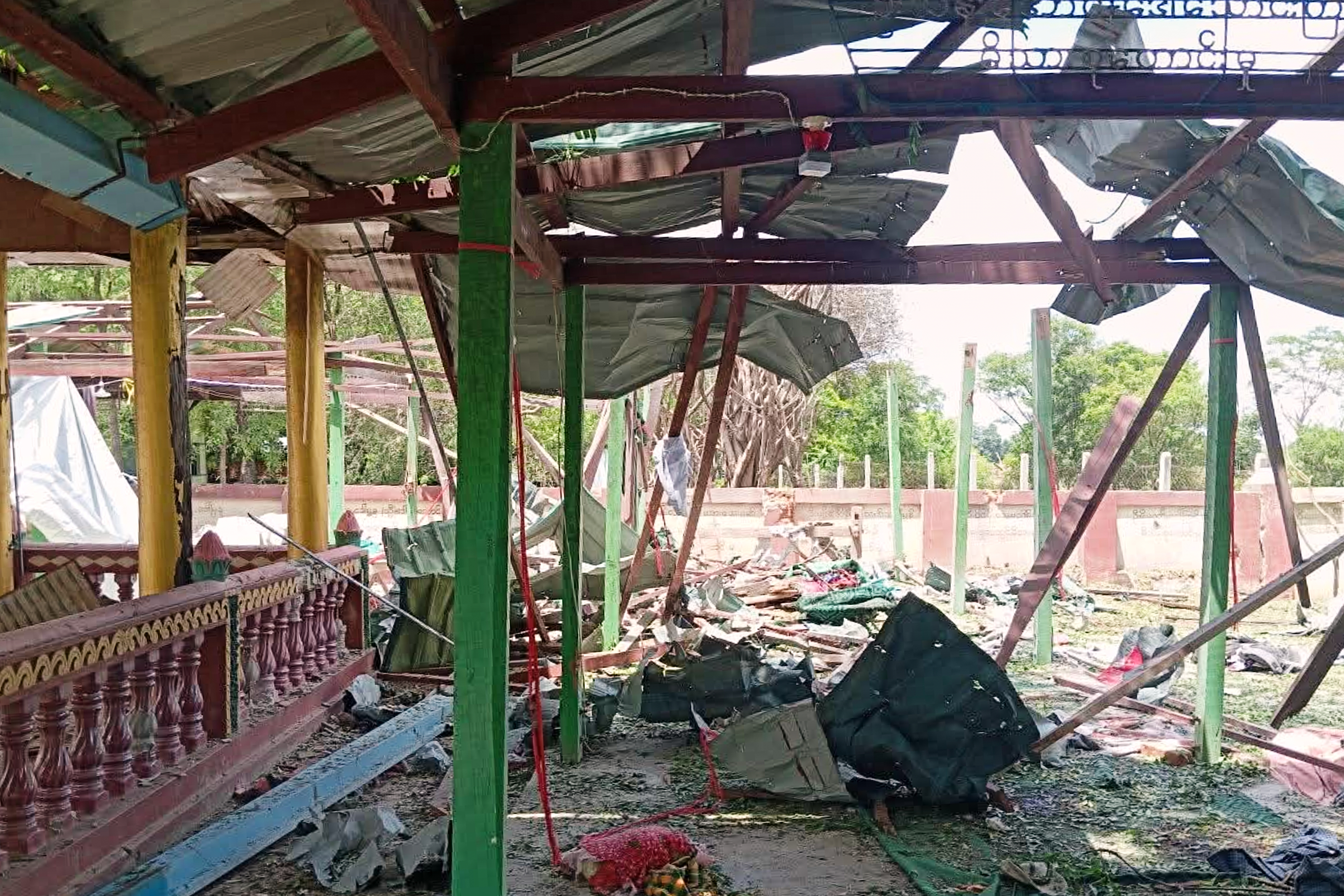 Debris litters a Buddhist monastery after an airstrike hit Swel Le Oh village in Myaung Township, Sagaing Region, Myanmar, on Friday, Aug. 21, 2026. [Ko Nway Oo/AP]
