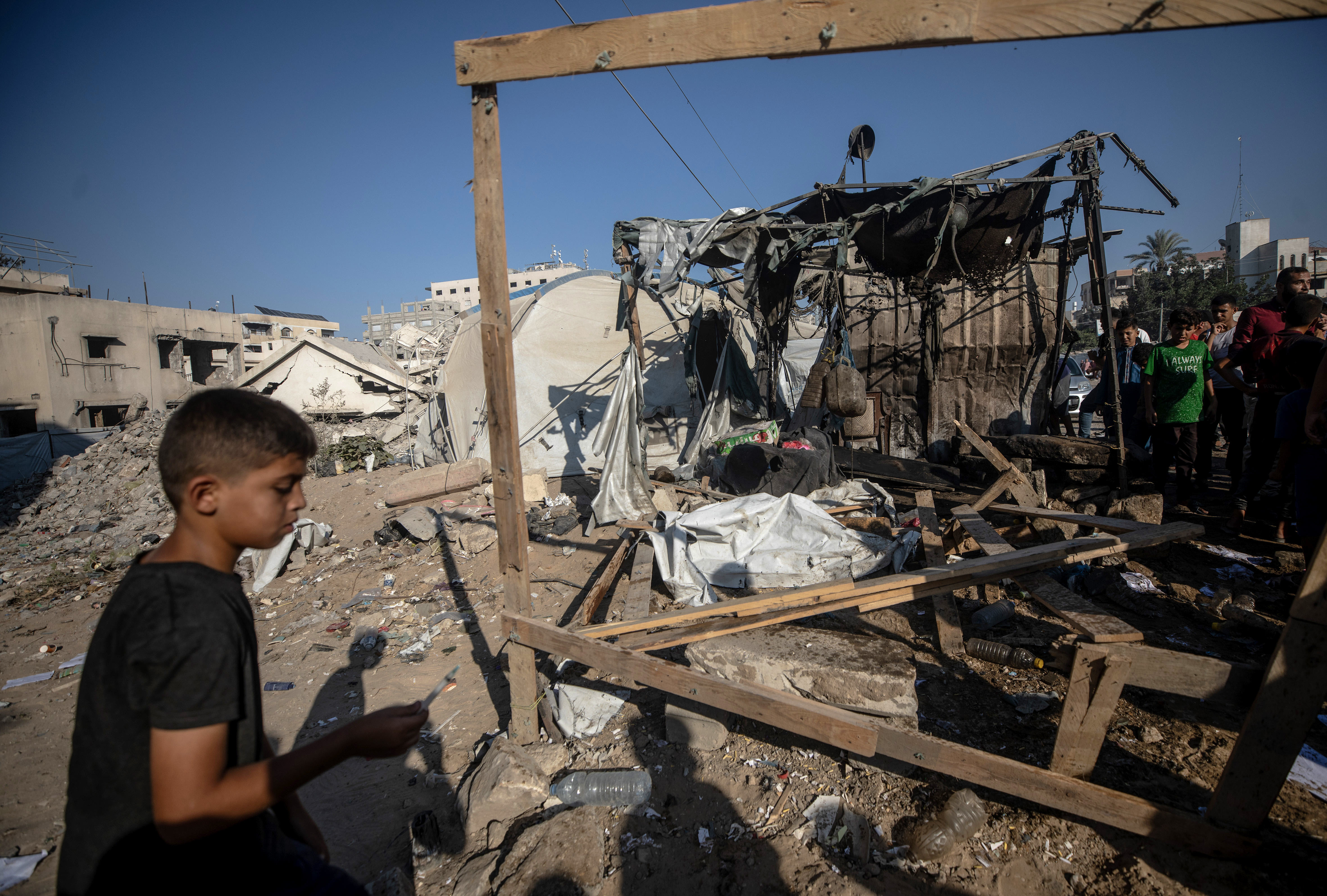 epa13194902 Palestinians inspect the damage following an Israeli airstrike in Gaza City, Gaza Strip, 27 August 2026. According to the Palestinian Ministry of Health in Gaza, at least one person was killed and three others injured following Israeli airstrikes in Gaza. EPA/MOHAMMED SABER
