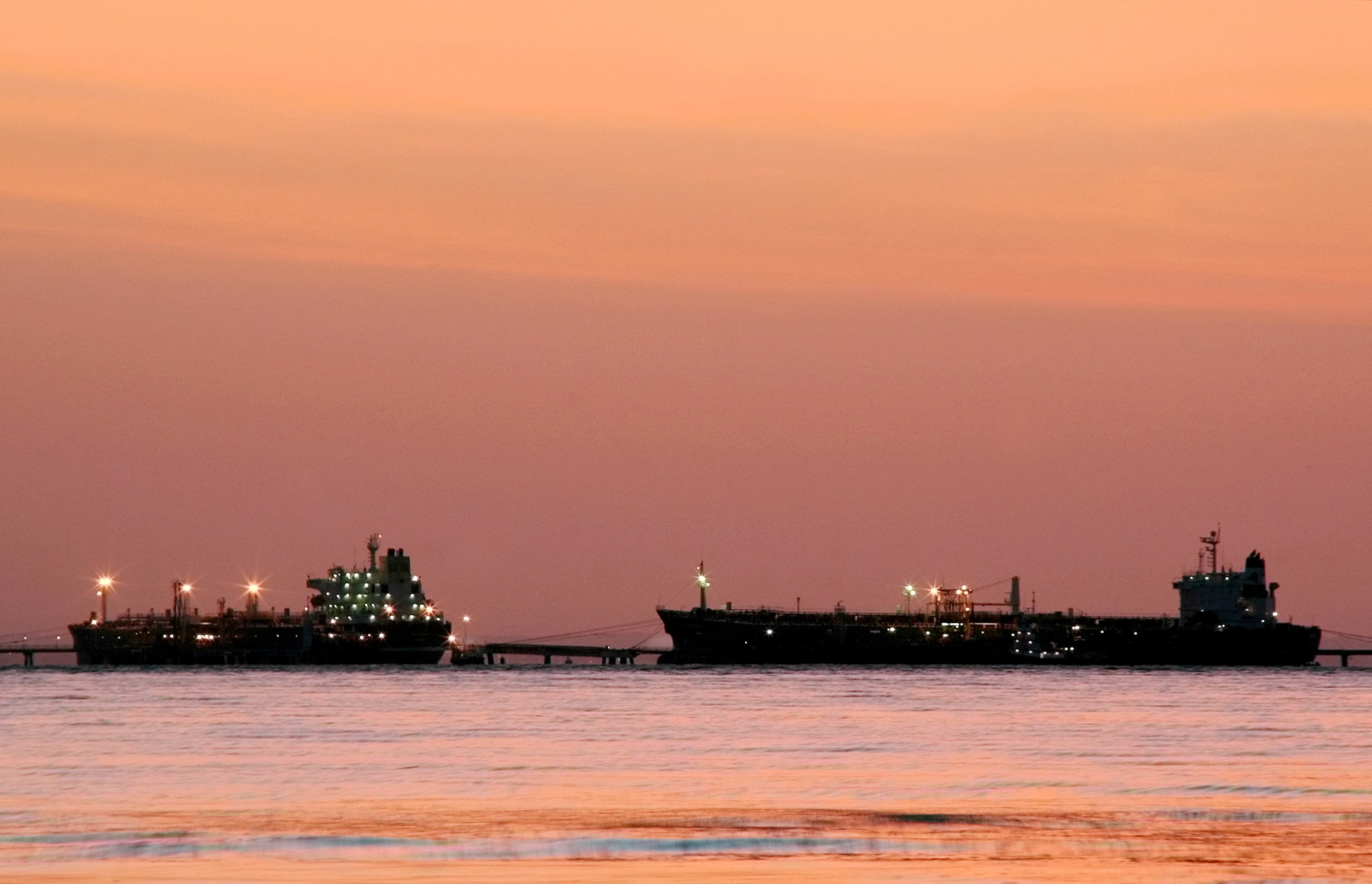 FILE: Oil tankers are seen at daybreak at the Bajo Grande Terminal located on the western shore of Lake Maracaibo, south of the city of Maracaibo, Venezuela [Raquel Chavez/Reuters]