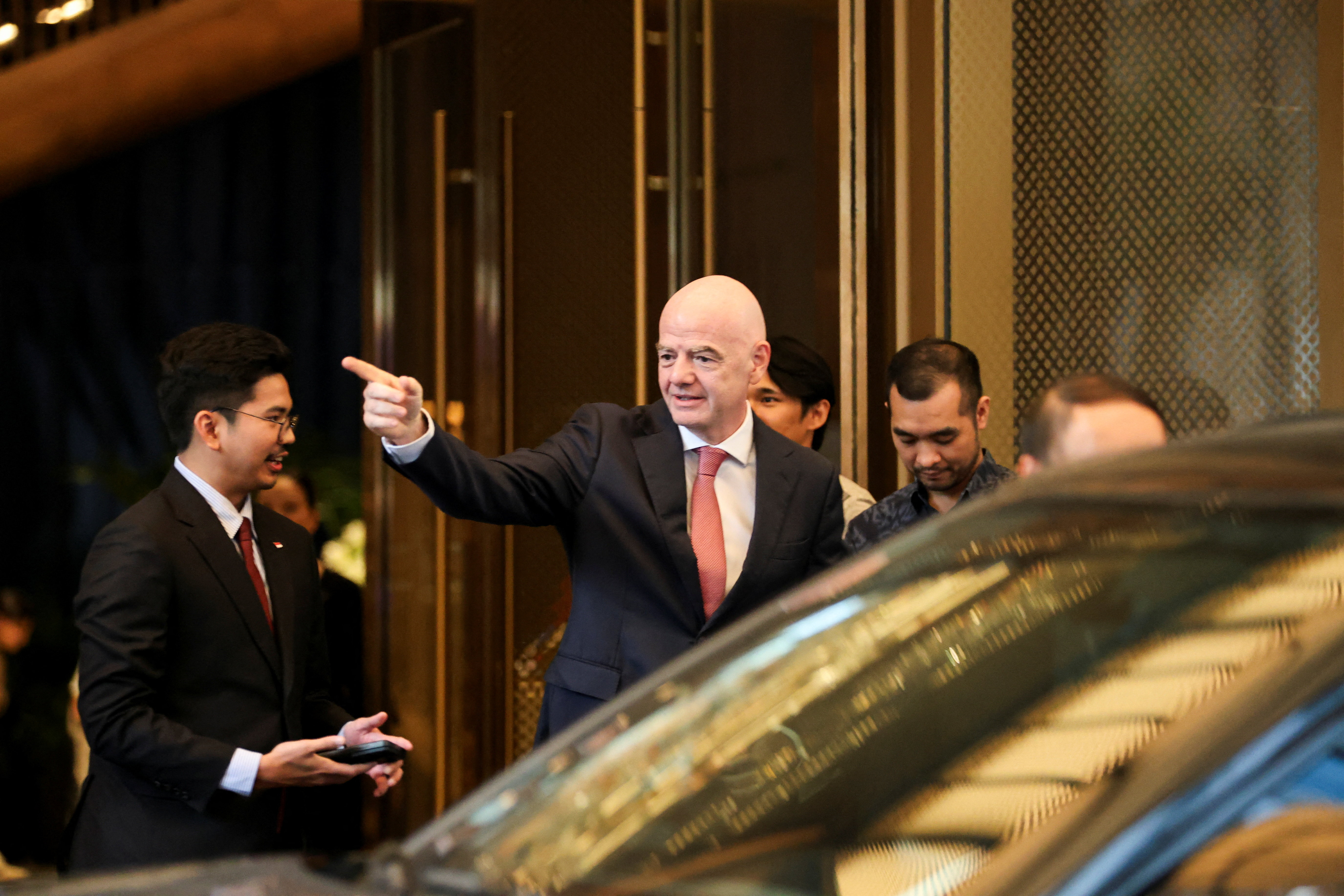 President of FIFA Gianni Infantino gestures as he arrives at Fairmont Hanoi Hotel ahead of the second leg of the 2026 ASEAN Cup final between Vietnam and Thailand, in Hanoi, Vietnam, August 26, 2026. REUTERS/Thinh Nguyen