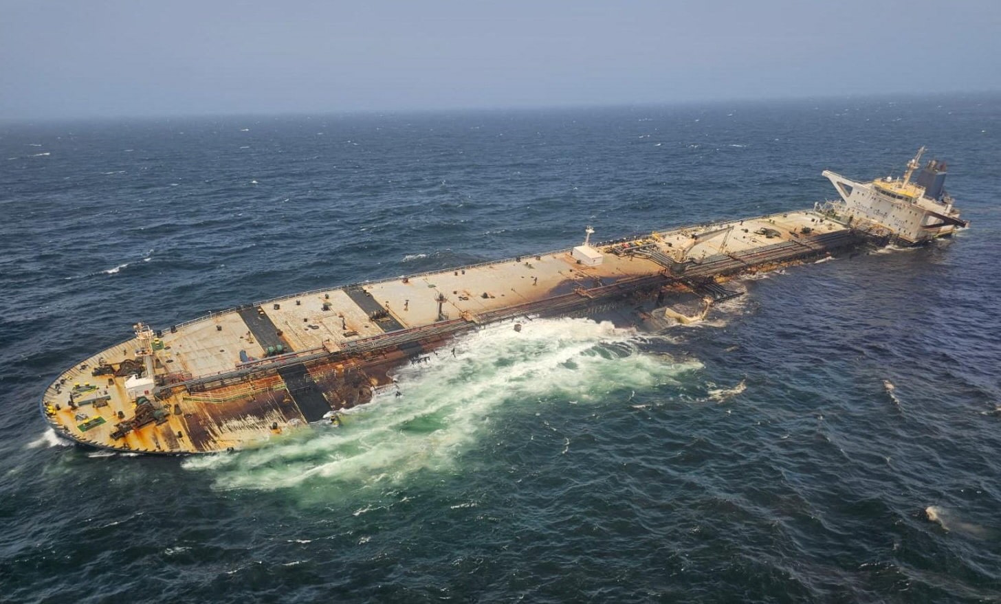The damaged and half sunk oil tanker Caroline Bezengi, at sea off the coast of Oman, on a date given as August 6, 2026 [File: Ambrey/Handout via Reuters]