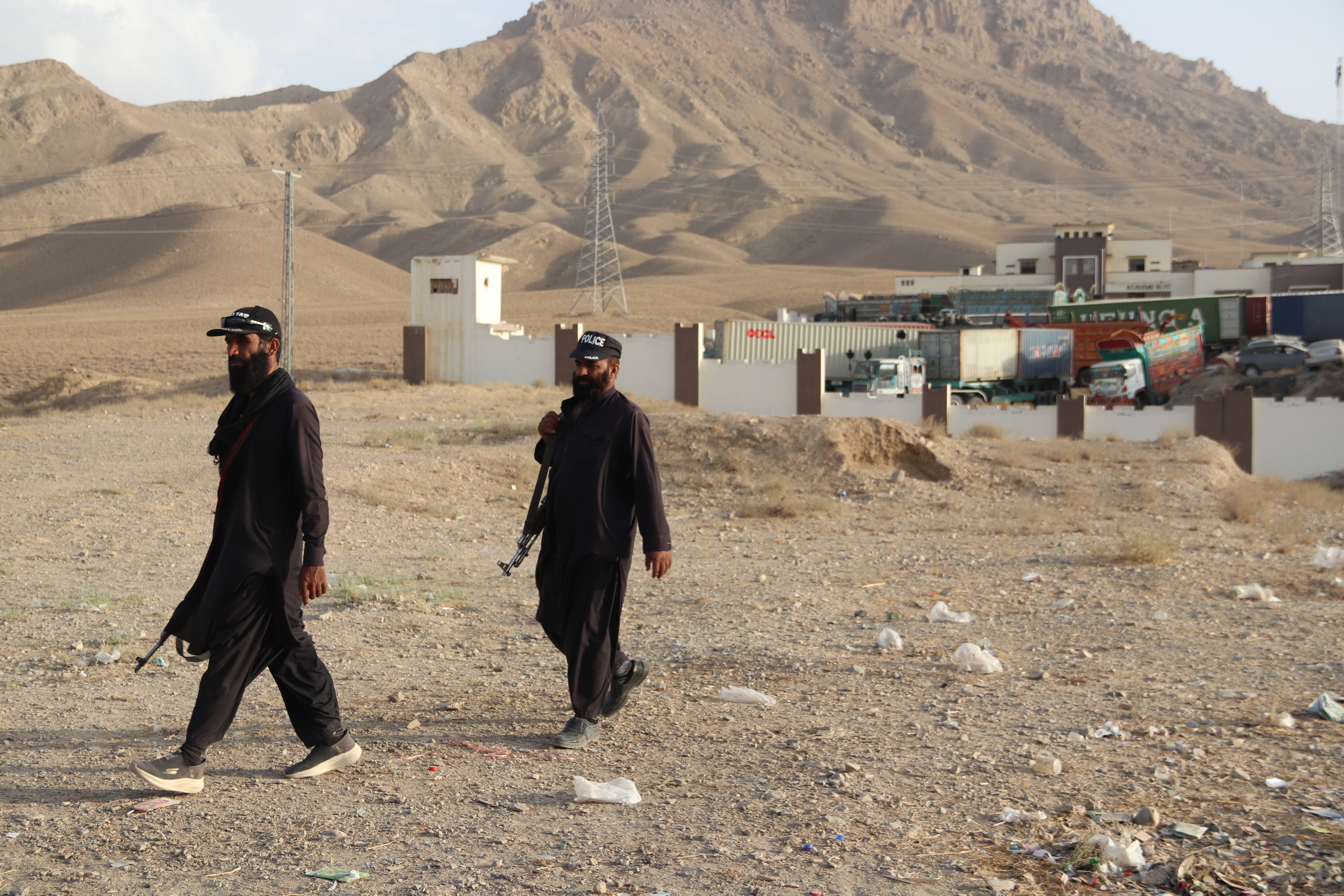 epa13205286 Pakistani security officials stand guard near the Customs regional warehouse where security forces and militants clashed following an attack in Pishin district, Balochistan, Pakista, 01 September 2026. Ten militants and six security personnel were killed during an overnight attack on a Customs House in Pishin, Balochistan. The province continues to face frequent militant attacks targeting security forces and government facilities. EPA/FAYYAZ AHMAD