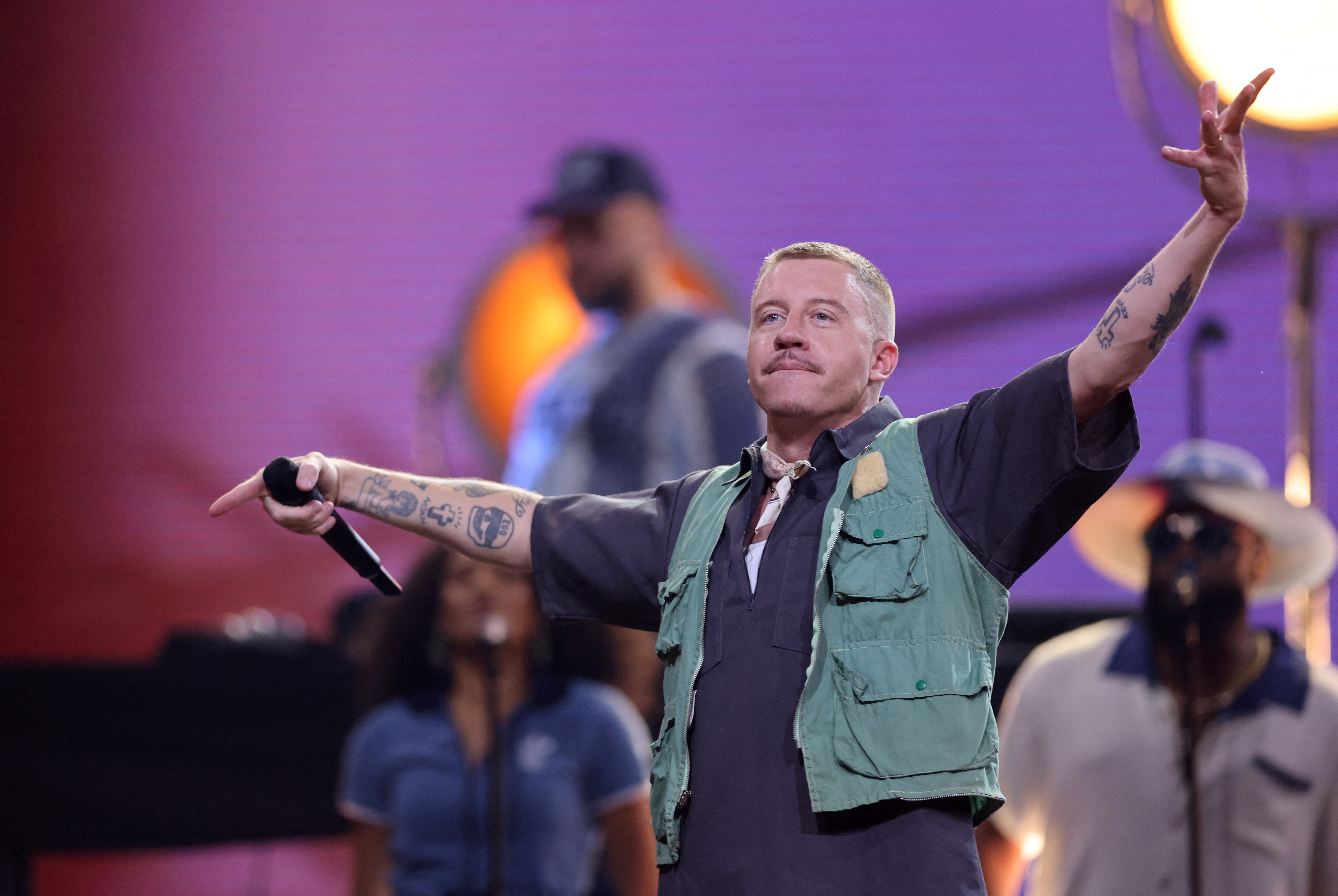Rapper Macklemore performs during the opening ceremony of the Invictus Games, in Duesseldorf, Germany, September 9, 2023. REUTERS/Thilo Schmuelgen