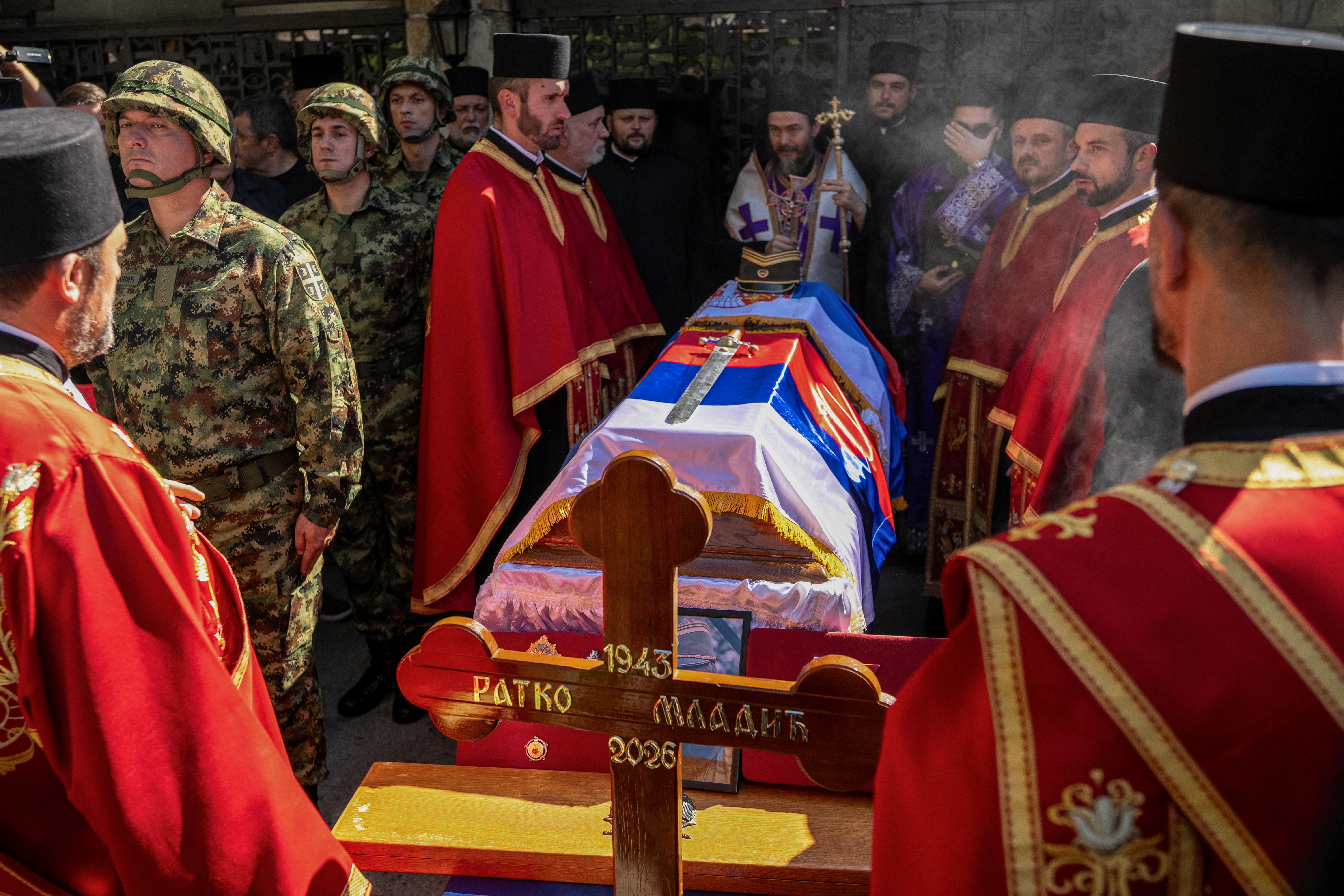Serbian Orthodox priests hold a ceremony during a funeral of former Bosnian Serb wartime general Ratko Mladic at the Topcider Cemetery in Belgrade, Serbia, September 7, 2026. REUTERS/Uros Arsic