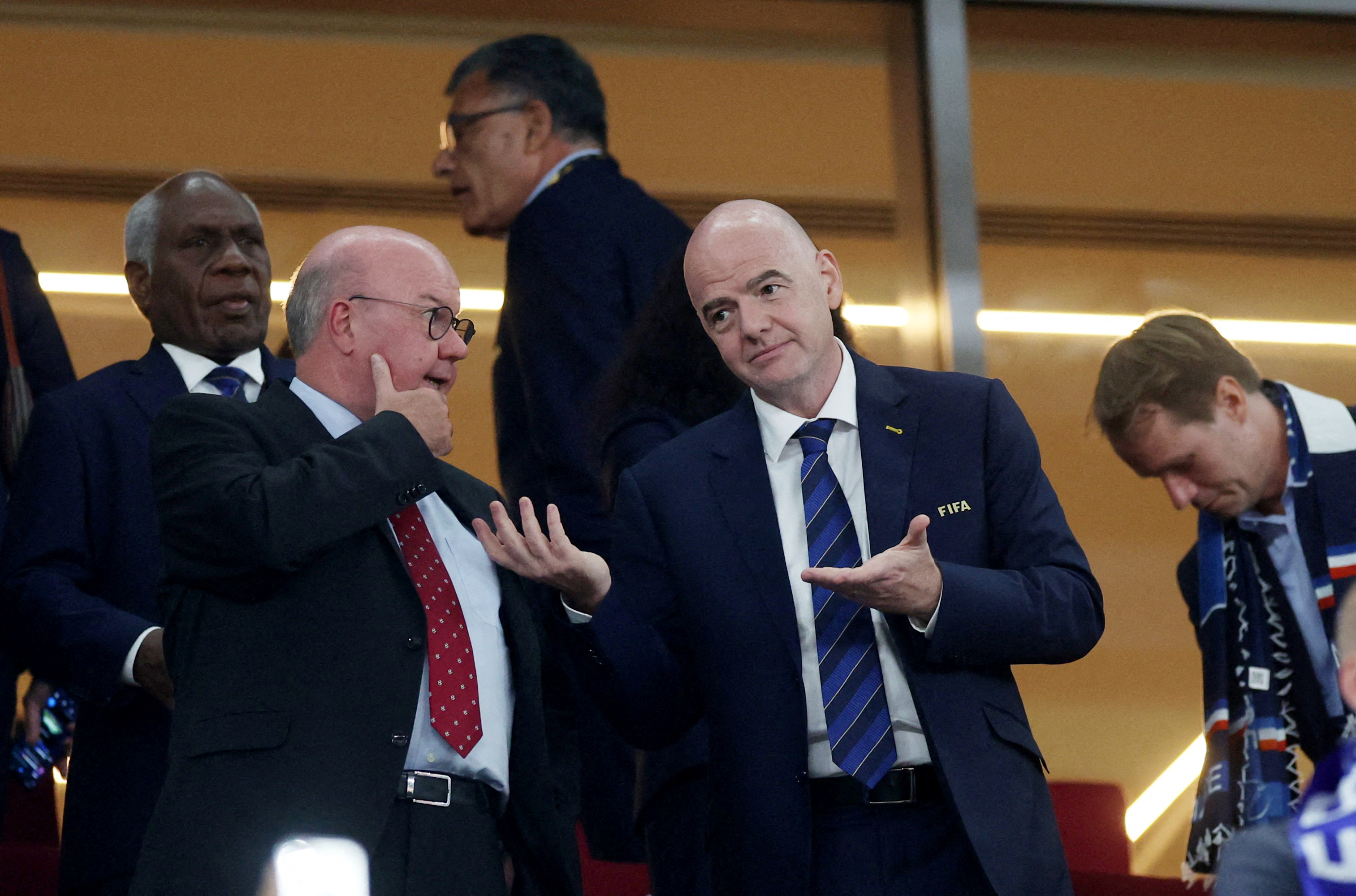 Denmark Football Association Chairman Jesper Moller and FIFA president Gianni Infantino are pictured in the stand before the match