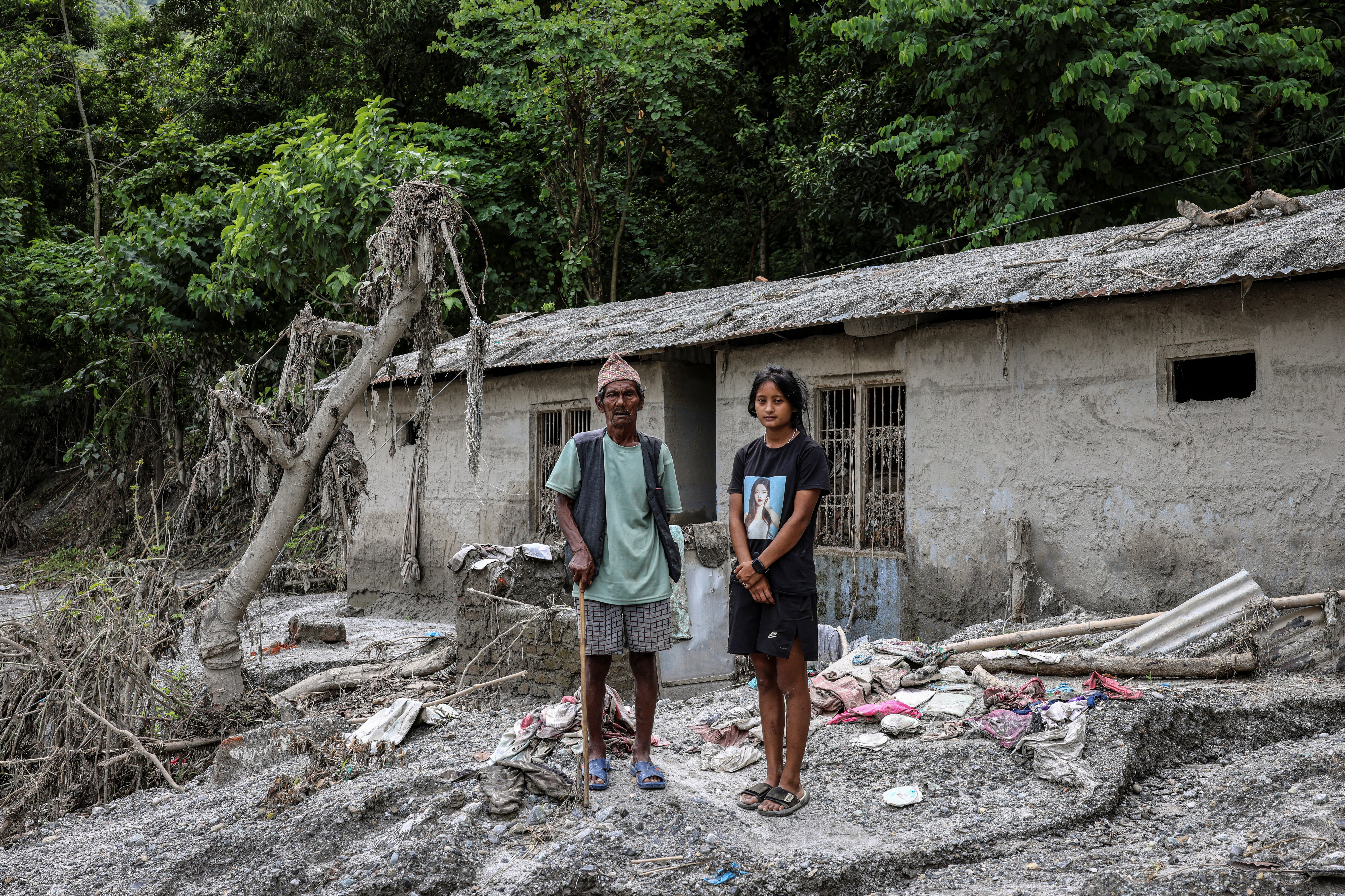 Nepal flood survivors find little trace of former lives