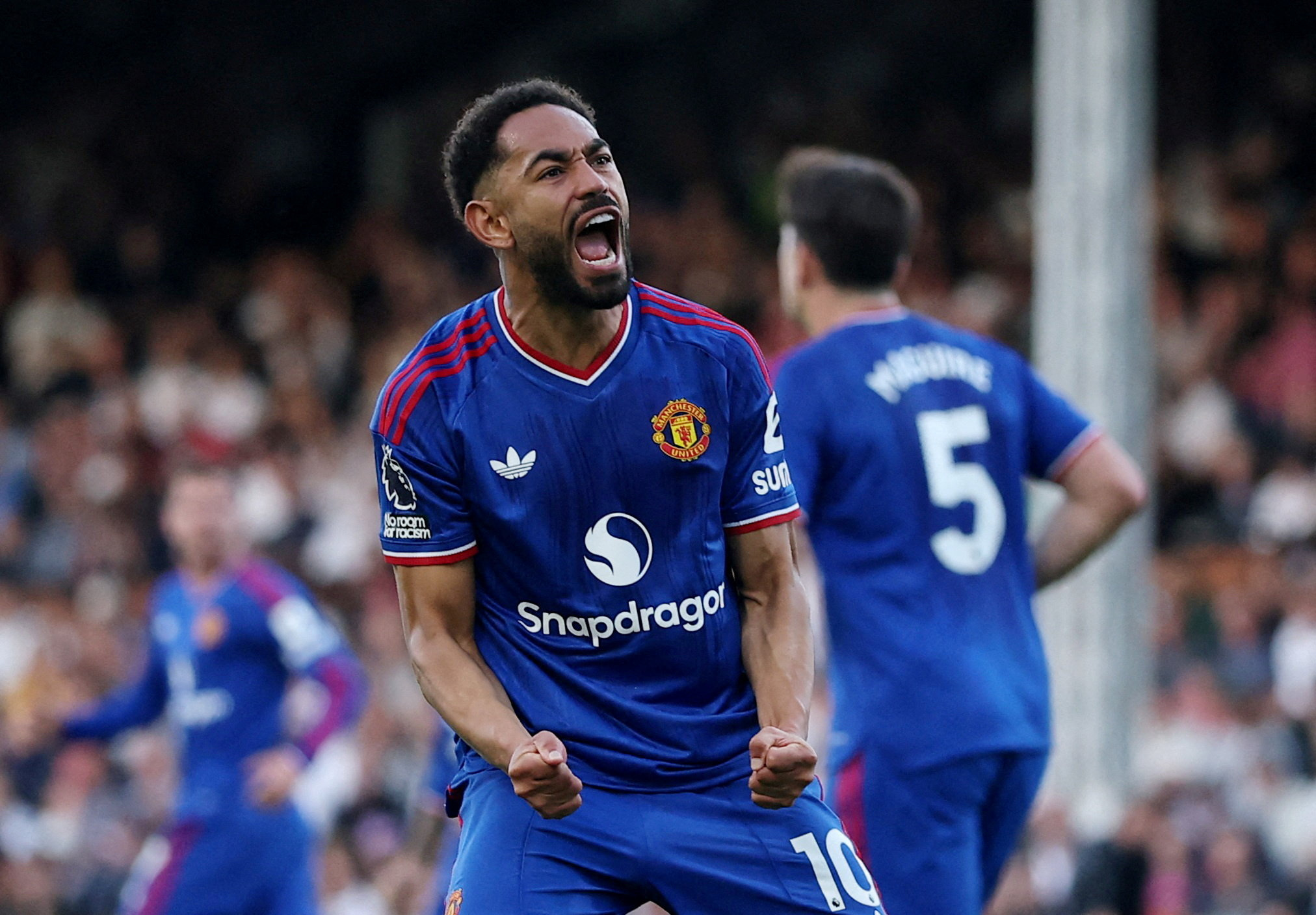 Manchester United's Matheus Cunha celebrates scoring their first goal