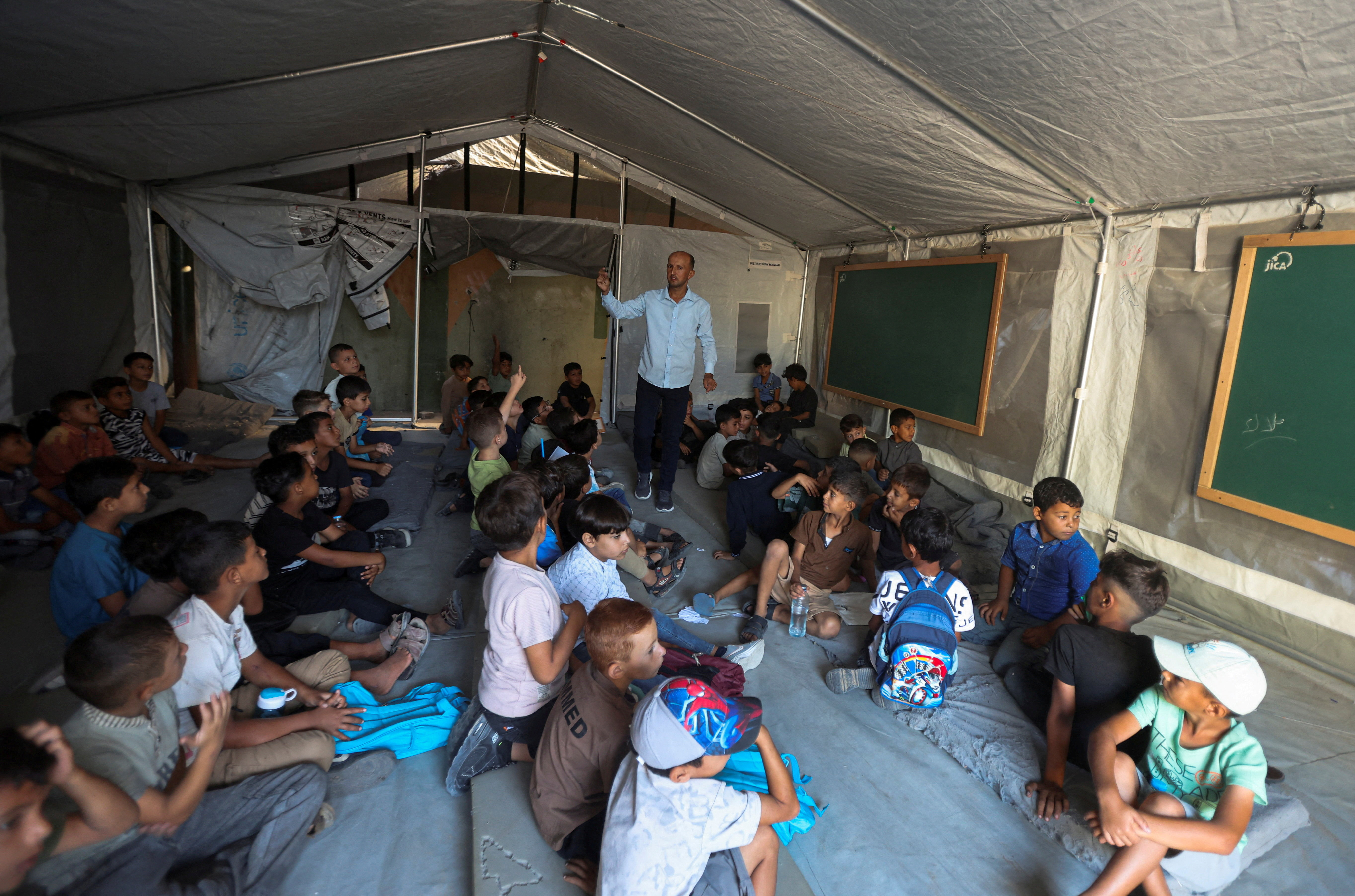 Gaza’s children return to class in tents and ruins