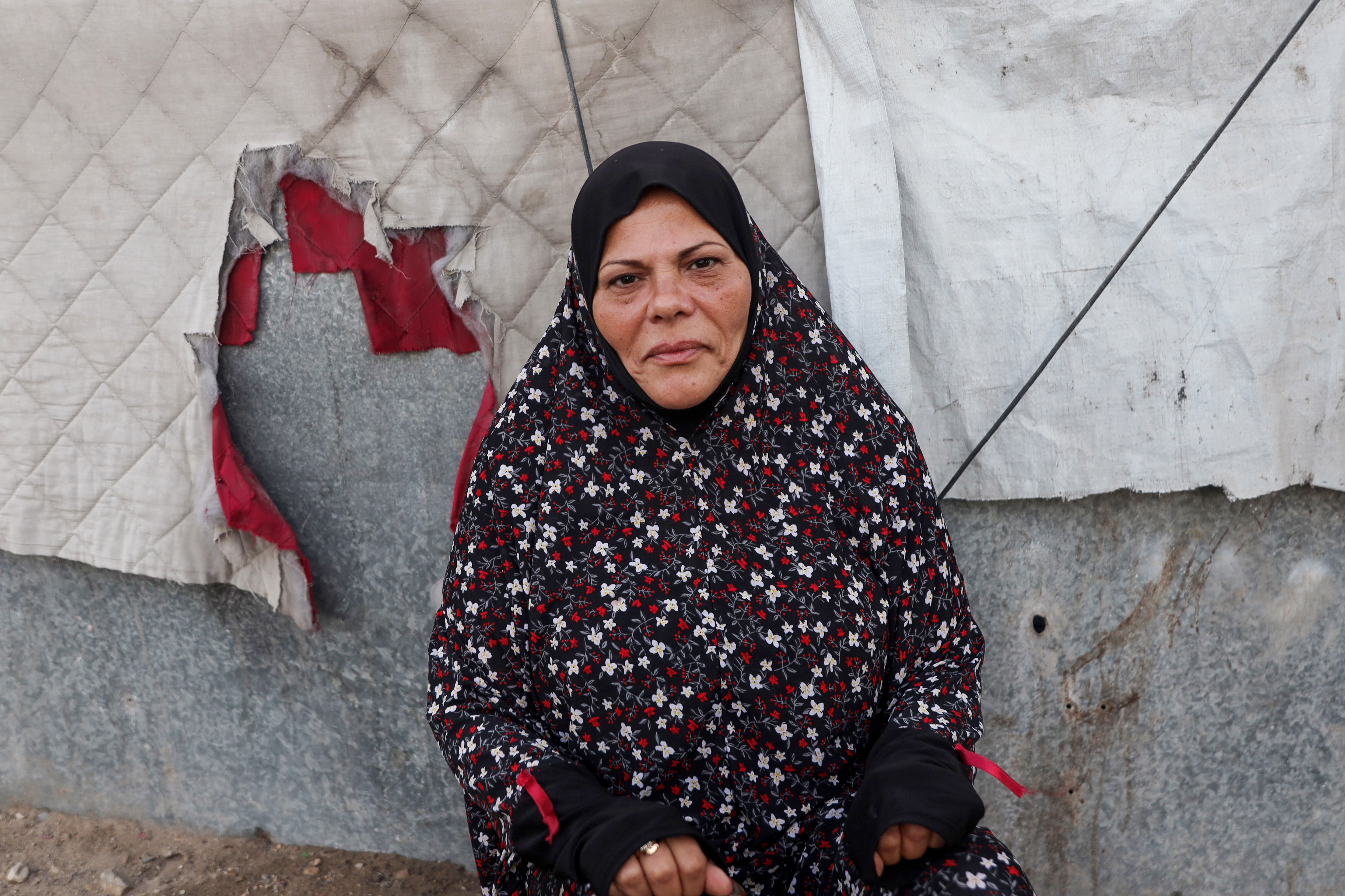 Umm Mohammed Khalil, 59, fears further escalation and hopes for an Israeli leader who will show compassion towards Palestinians. [Abdelhakim Abu Riash/ Al Jazeera]