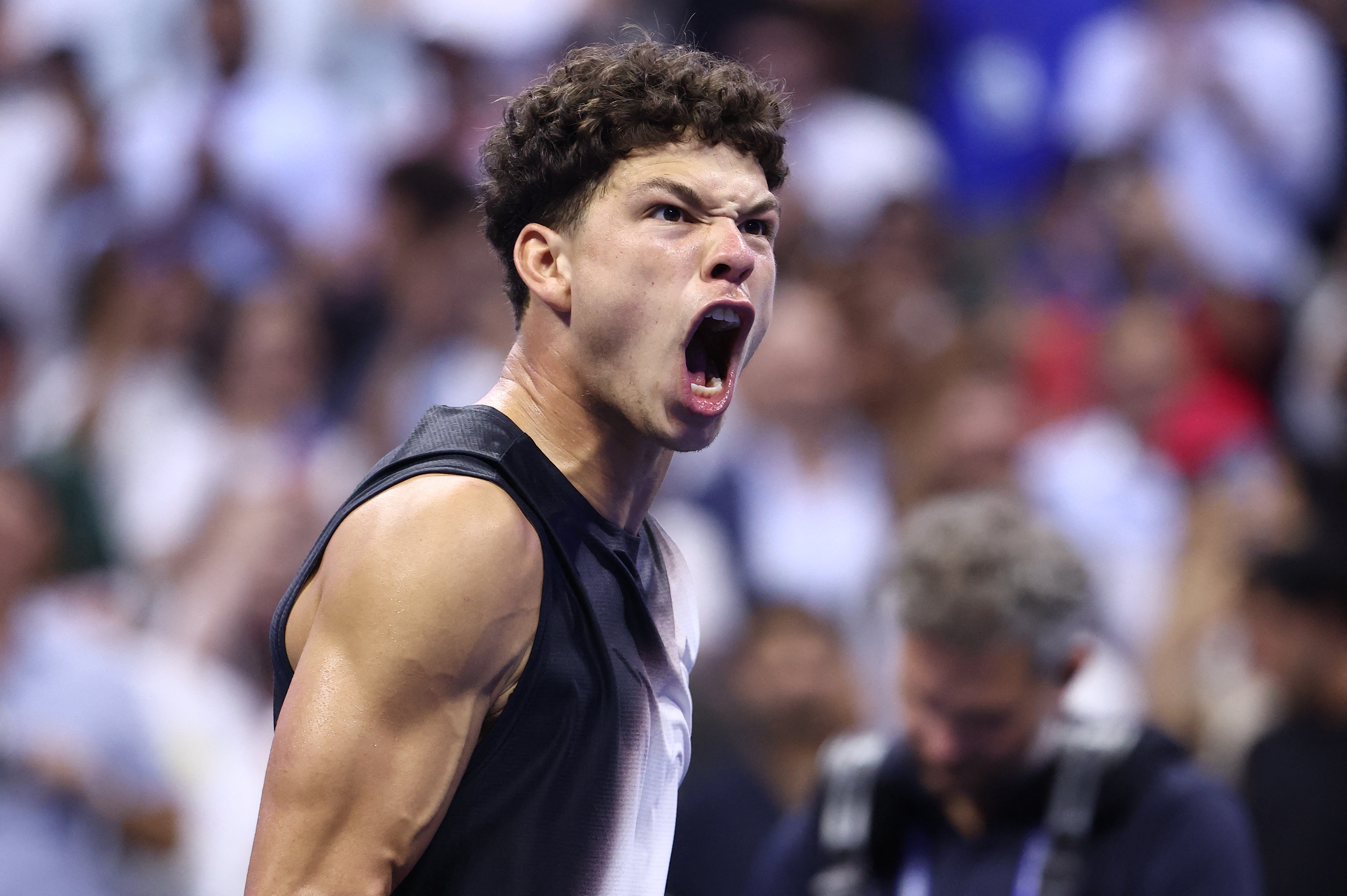 USA's Ben Shelton celebrates his win against Spain's Carlos Alcaraz during the men's singles quarter-final tennis match on day ten of the US Open tennis tournament at the USTA Billie Jean King National Tennis Center in New York City on September 9, 2026. (Photo by Leonardo MUNOZ / AFP) / The erroneous mention[s] appearing in the metadata of this photo by Leonardo MUNOZ has been modified in AFP systems in the following manner: [USA's Ben Shelton] instead of [Spain's Carlos Alcaraz]. Please immediately remove the erroneous mention[s] from all your online services and delete it (them) from your servers. If you have been authorized by AFP to distribute it (them) to third parties, please ensure that the same actions are carried out by them. Failure to promptly comply with these instructions will entail liability on your part for any continued or post notification usage. Therefore we thank you very much for all your attention and prompt action. We are sorry for the inconvenience this notification may cause and remain at your disposal for any further information you may require.