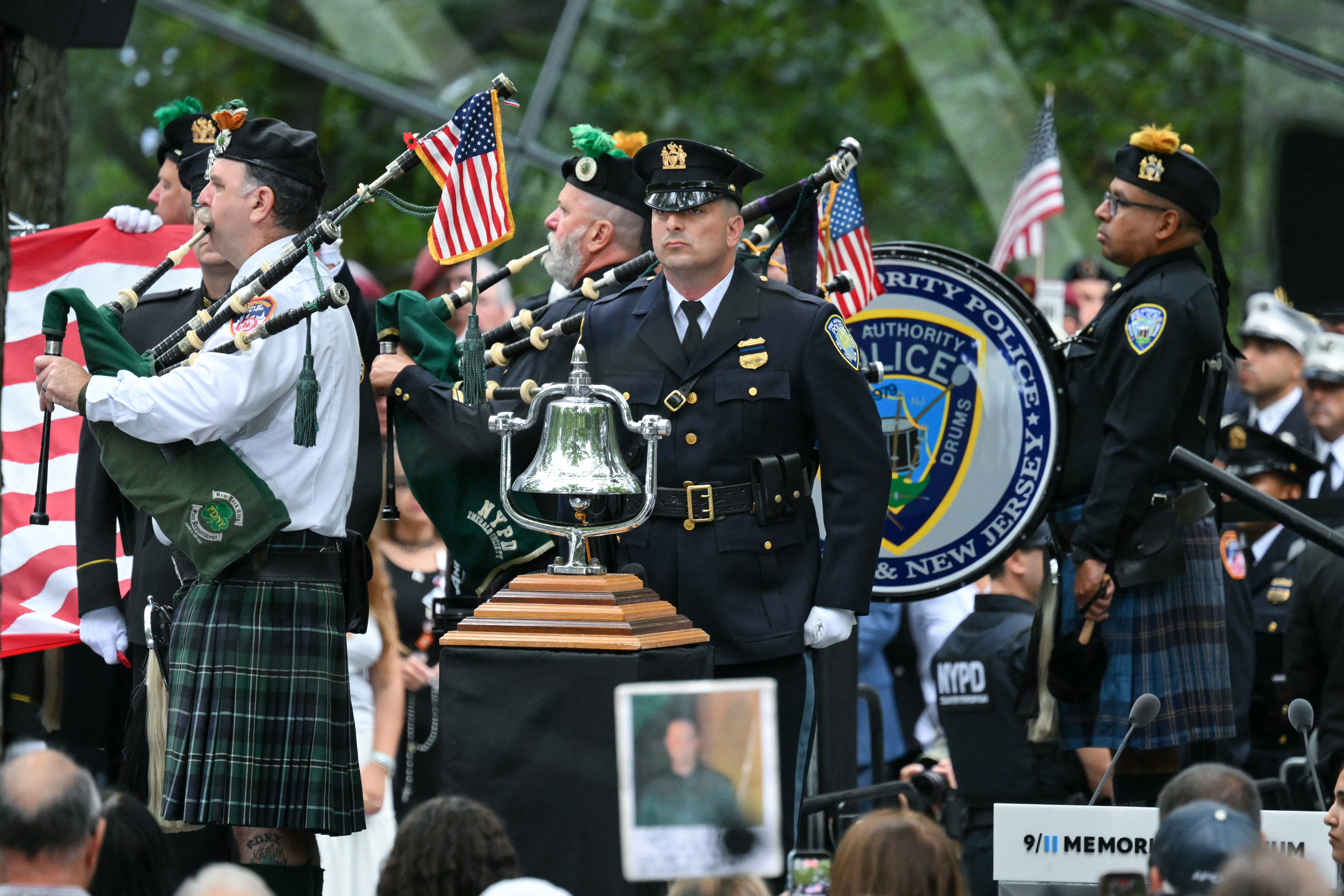 Bagpipers play during the 25th anniversary commemoration of the September 11, 2001 attacks at the National September 11 Memorial in New York on September 11, 2026. (Photo by ANGELA WEISS / AFP)