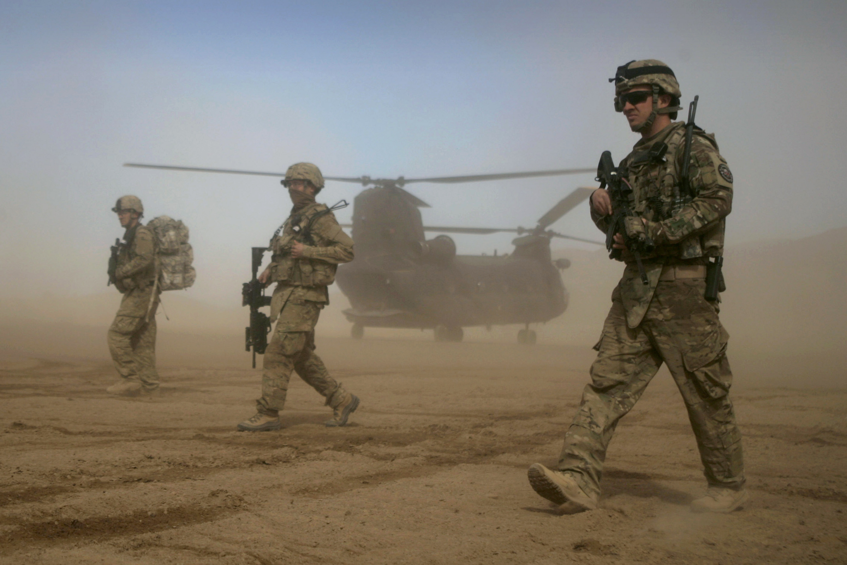 In this Jan. 28, 2012 file photo, U.S. soldiers, part of the NATO- led International Security Assistance Force (ISAF) patrol west of Kabul, Afghanistan. [Hoshang Hashimi/AP Photo]