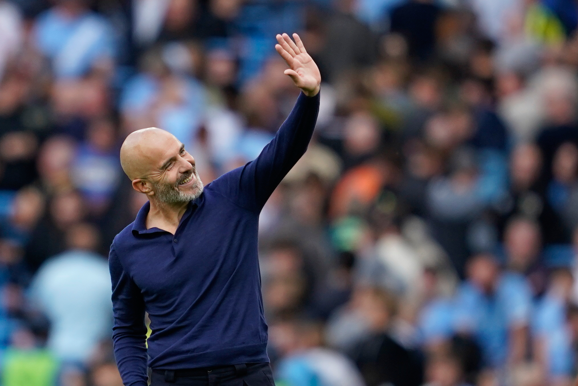 Manchester City's head coach Enzo Maresca greets supporters after the English Premier League soccer match between Manchester City and Coventry City in Manchester, England, Saturday, Sept. 5, 2026. (AP Photo/Dave Thompson)
