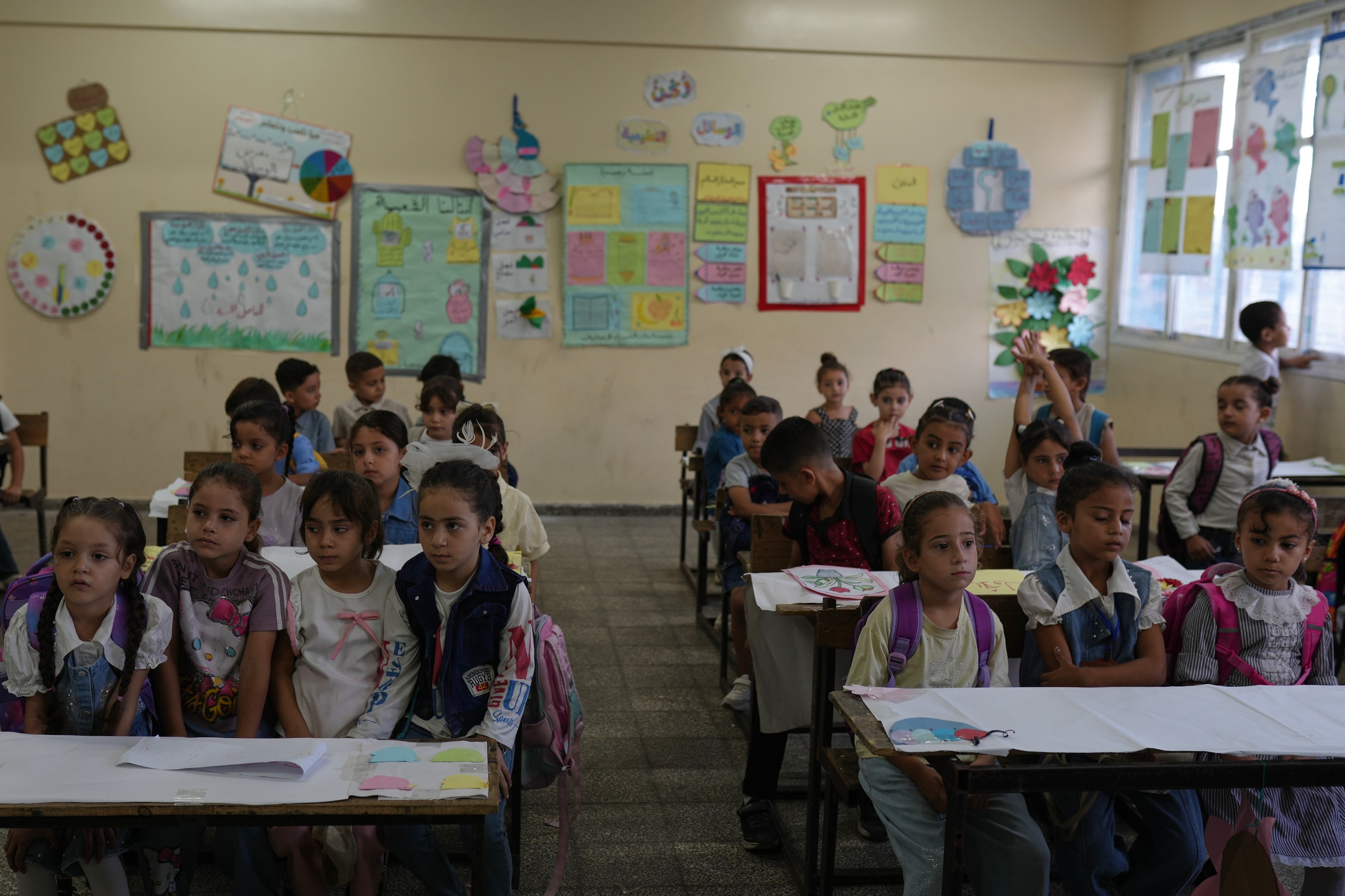 Gaza’s children return to class in tents and ruins