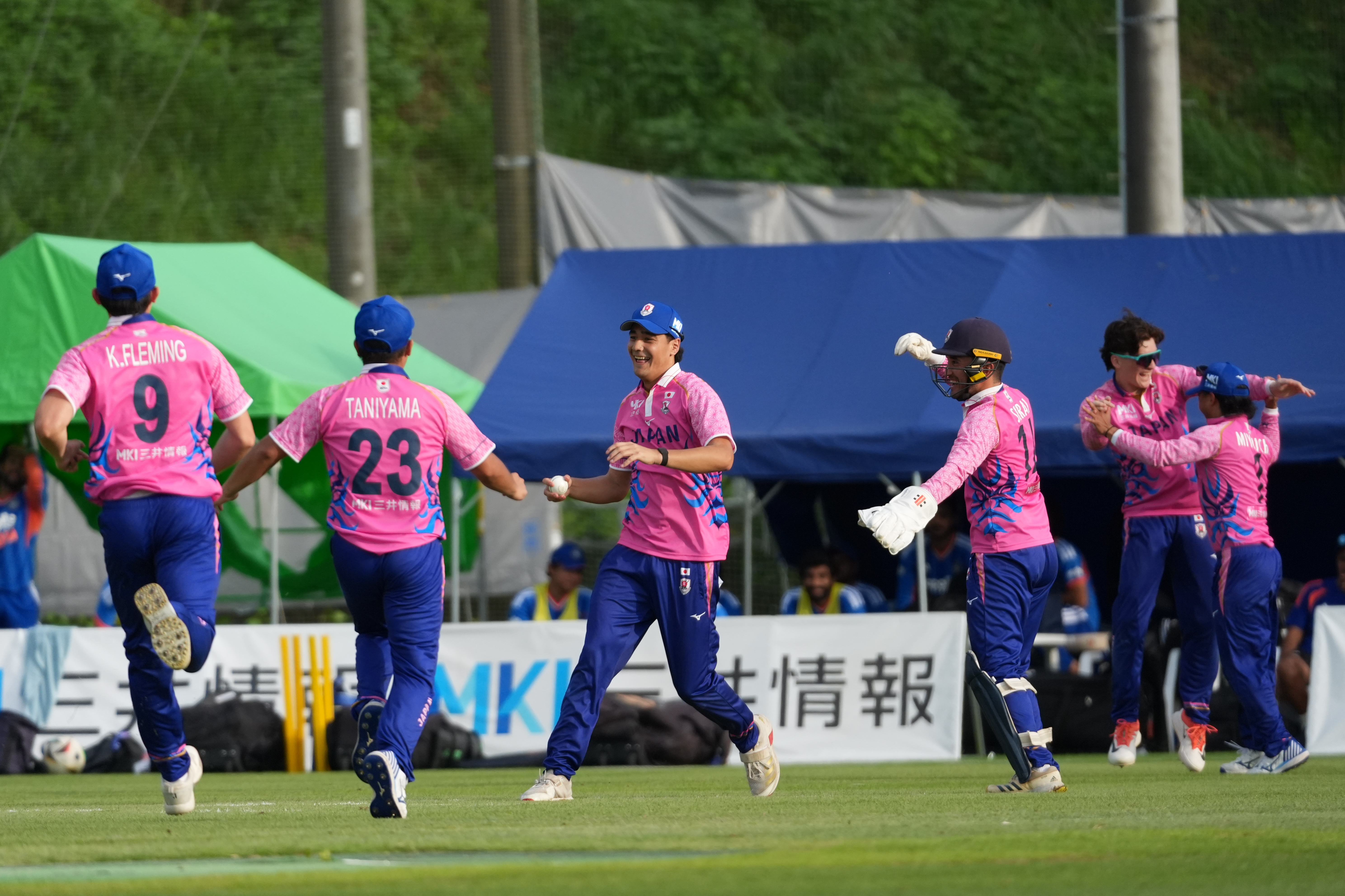 Japan's players celebrate a Indian wicket during the Suzuki Cup T20 cricket match in Sano, Japan, Tuesday, Sept. 22, 2026, marking 75 years of diplomatic relations between the two countries. (AP Photo/Tomohiro Ohsumi)