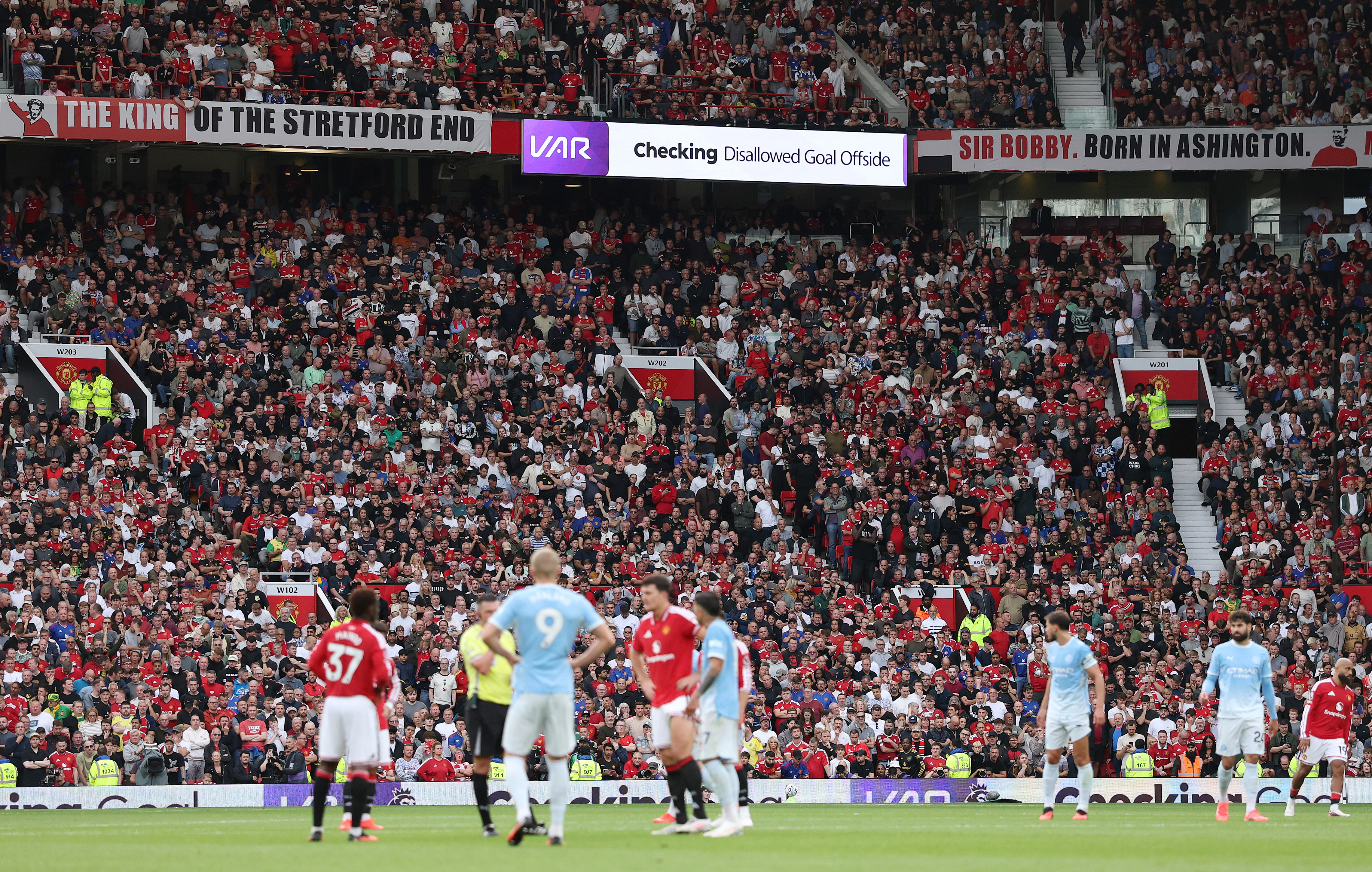 MANCHESTER, ENGLAND - SEPTEMBER 13: General view inside the stadium as the LED screen shows Erling Haaland of Manchester City goal being checked for offside by VAR during the Premier League 2026/27 match between Manchester United and Manchester City at Old Trafford on September 13, 2026 in Manchester, England. (Photo by Michael Regan/Getty Images)
