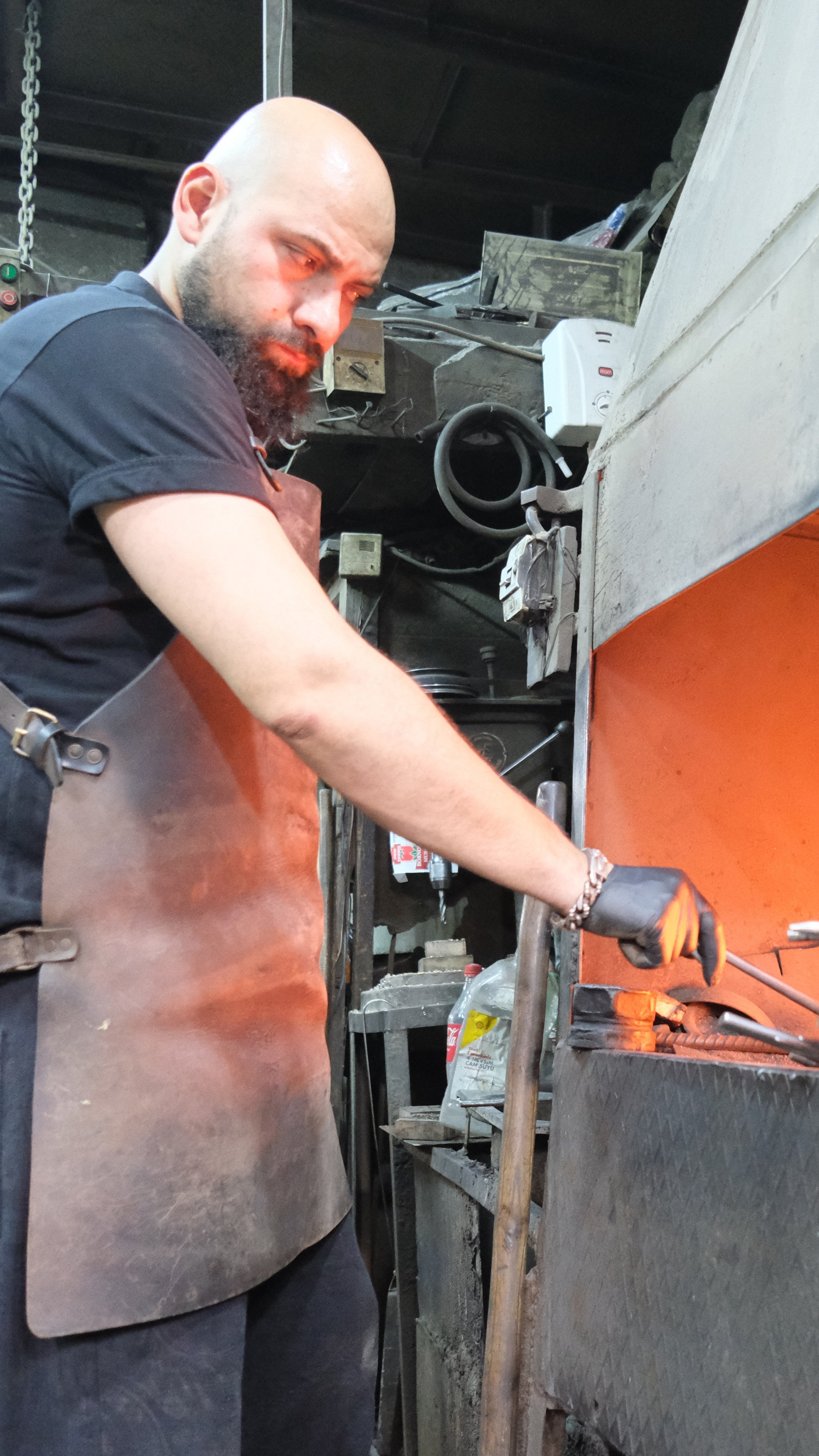 Suleyman Akdemir at the forge where, for nine years, he worked into the night, after the family’s traditional orders had been completed for the day