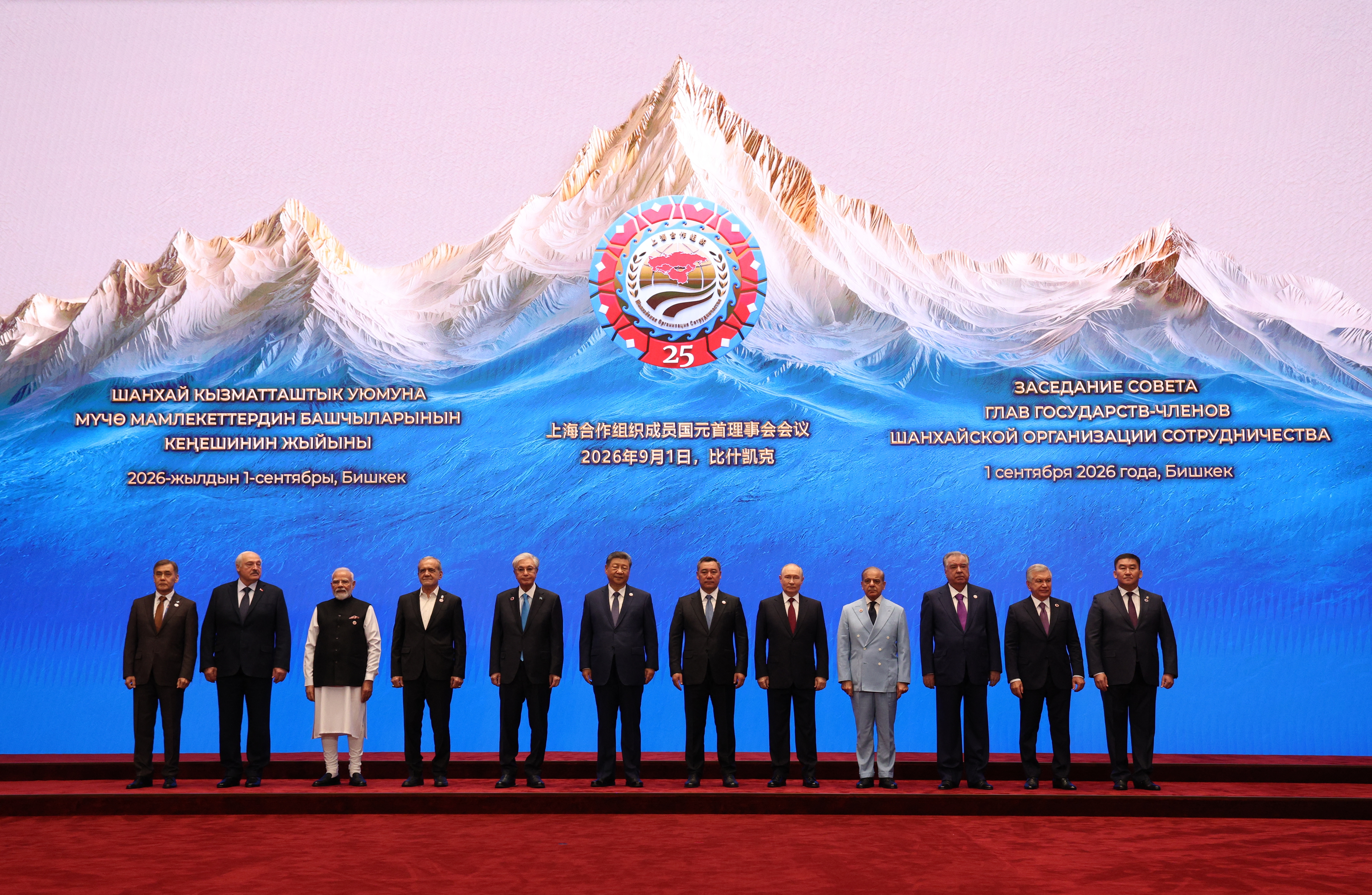 In this pool photograph distributed by the Russian state agency Sputnik, leaders, including Belarus' President Alexander Lukashenko, Indian Prime Minister Narendra Modi, Iran's President Masoud Pezeshkian, Kazakhstan's President Kassym-Jomart Tokayev, China's President Xi Jinping, Kyrgyzstan's President Sadyr Japarov, Russia's President Vladimir Putin, Pakistan's Prime Minister Shehbaz Sharif, Tajikistan's President Emomali Rakhmon and Uzbekistan's President Shavkat Mirziyoyev, pose for a family photo prior to the Shanghai Cooperation Organisation (SCO) summit in Bishkek on September 1, 2026. (Photo by Vyacheslav PROKOFYEV / POOL / AFP)