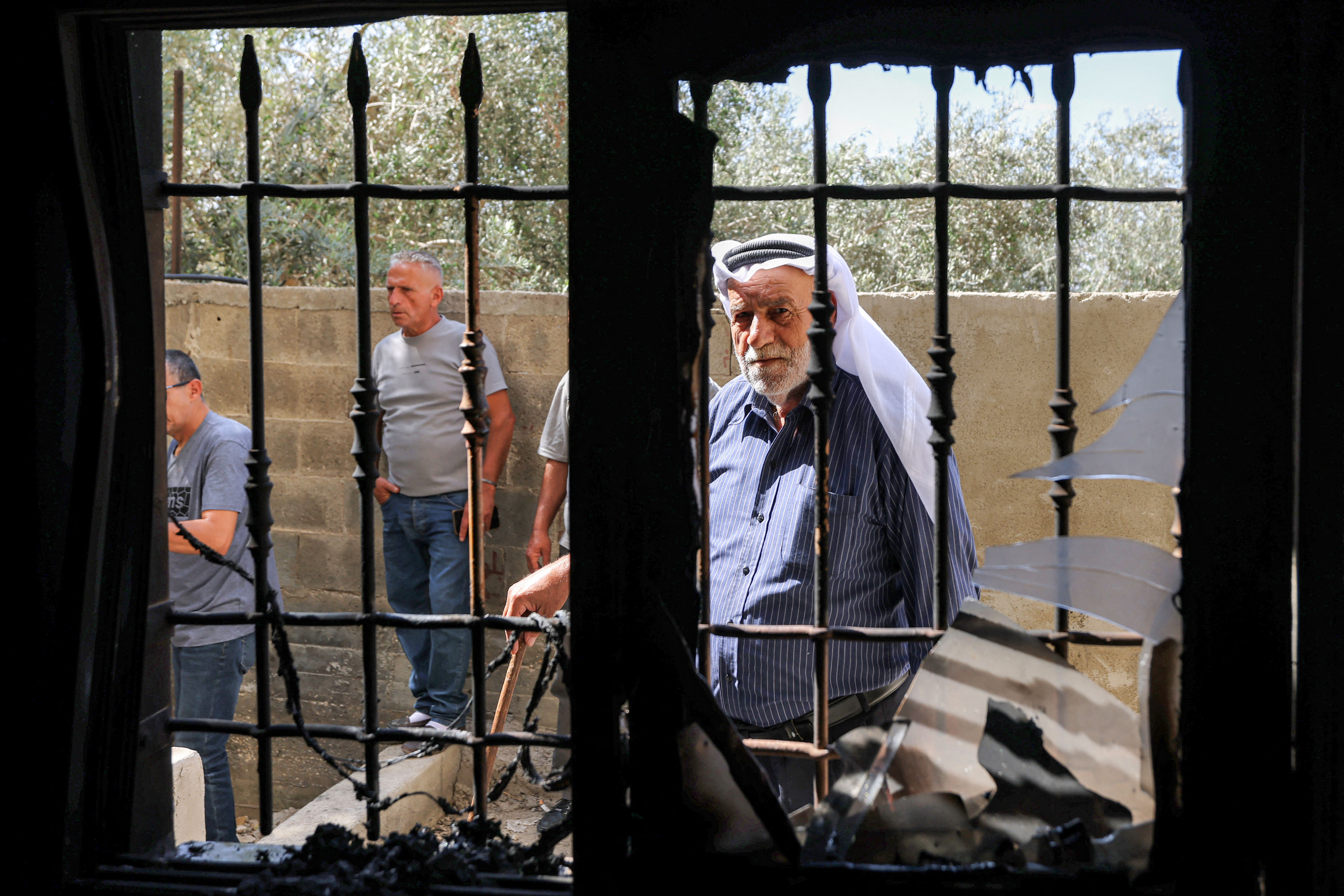 People inspect a mosque that was reportedly attacked by Israeli settlers in the Palestinian village of Bazzaryah, in the Israeli-occupied West Bank, on September 1, 2026.