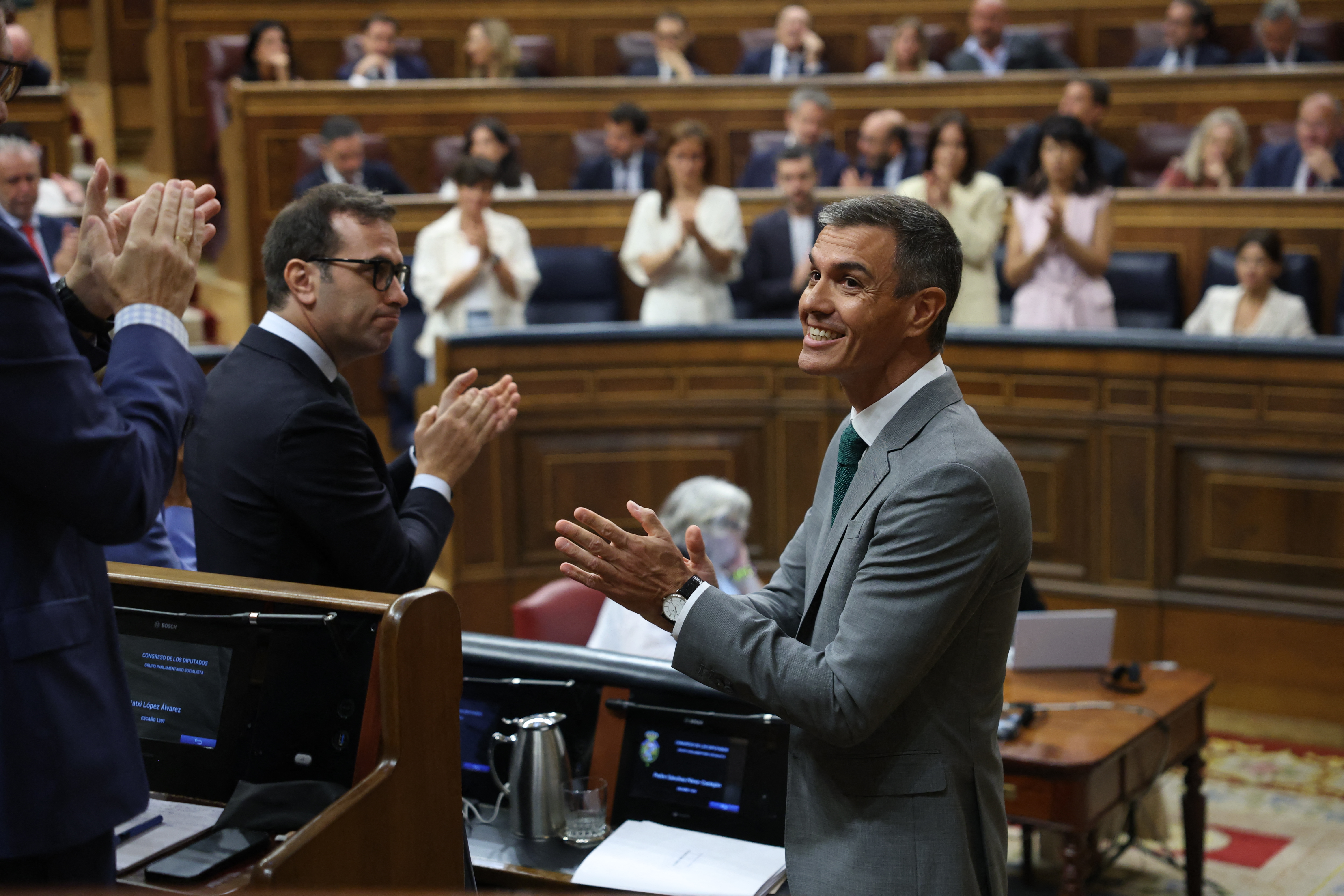 Spain's Prime Minister Pedro Sanchez applauds after addressing the congress of deputies on the government's handling of the situation in Spain's North African enclave Ceuta after a mass influx of migrants, at the lower house of parliament in Madrid on September 3, 2026.