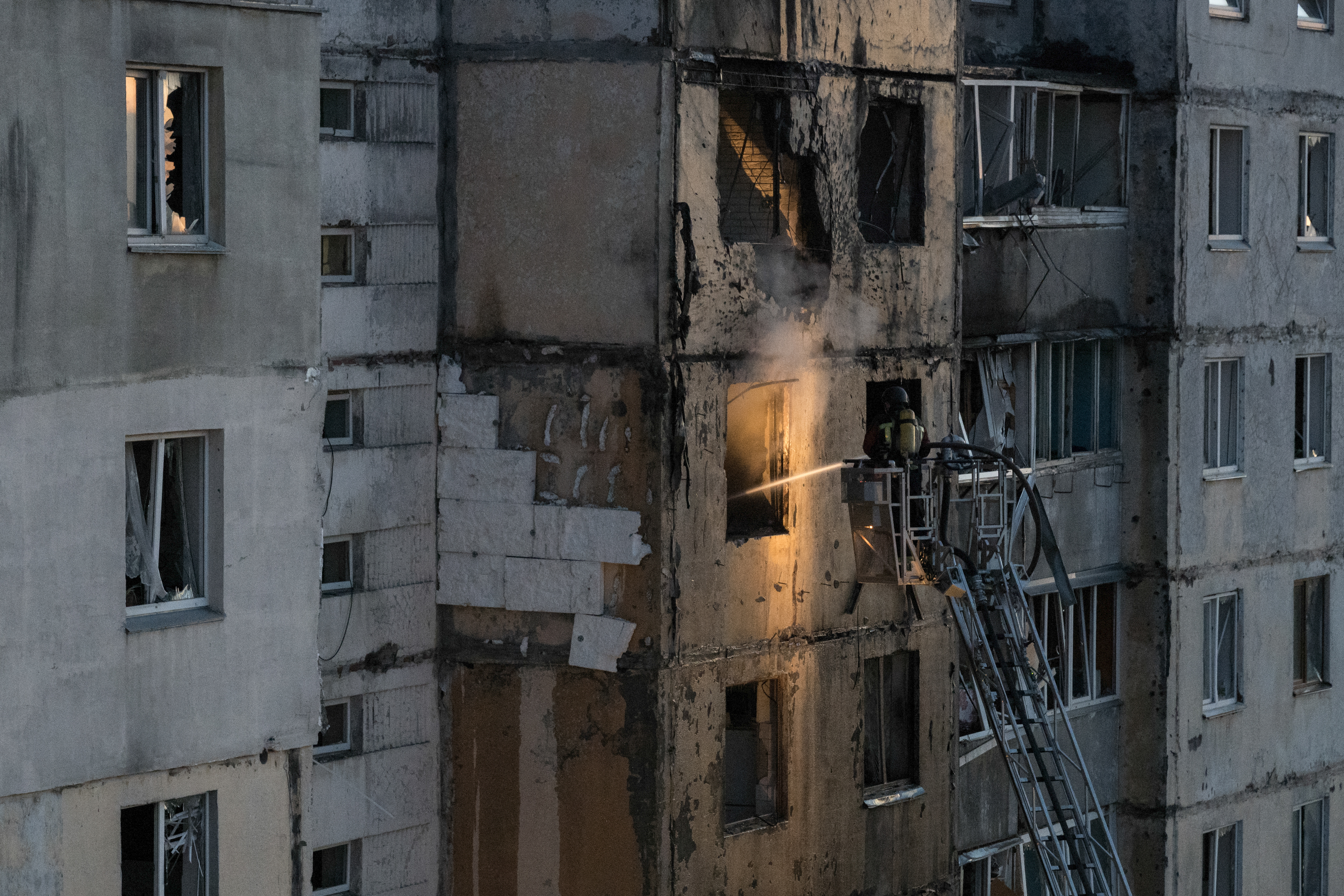 Ukrainian rescuers work at the site of a damaged residential building following a Russian strike in Kyiv on September 3, 2026, amid the Russian invasion of Ukraine. (Photo by Vladyslav Musiienko / AFP)