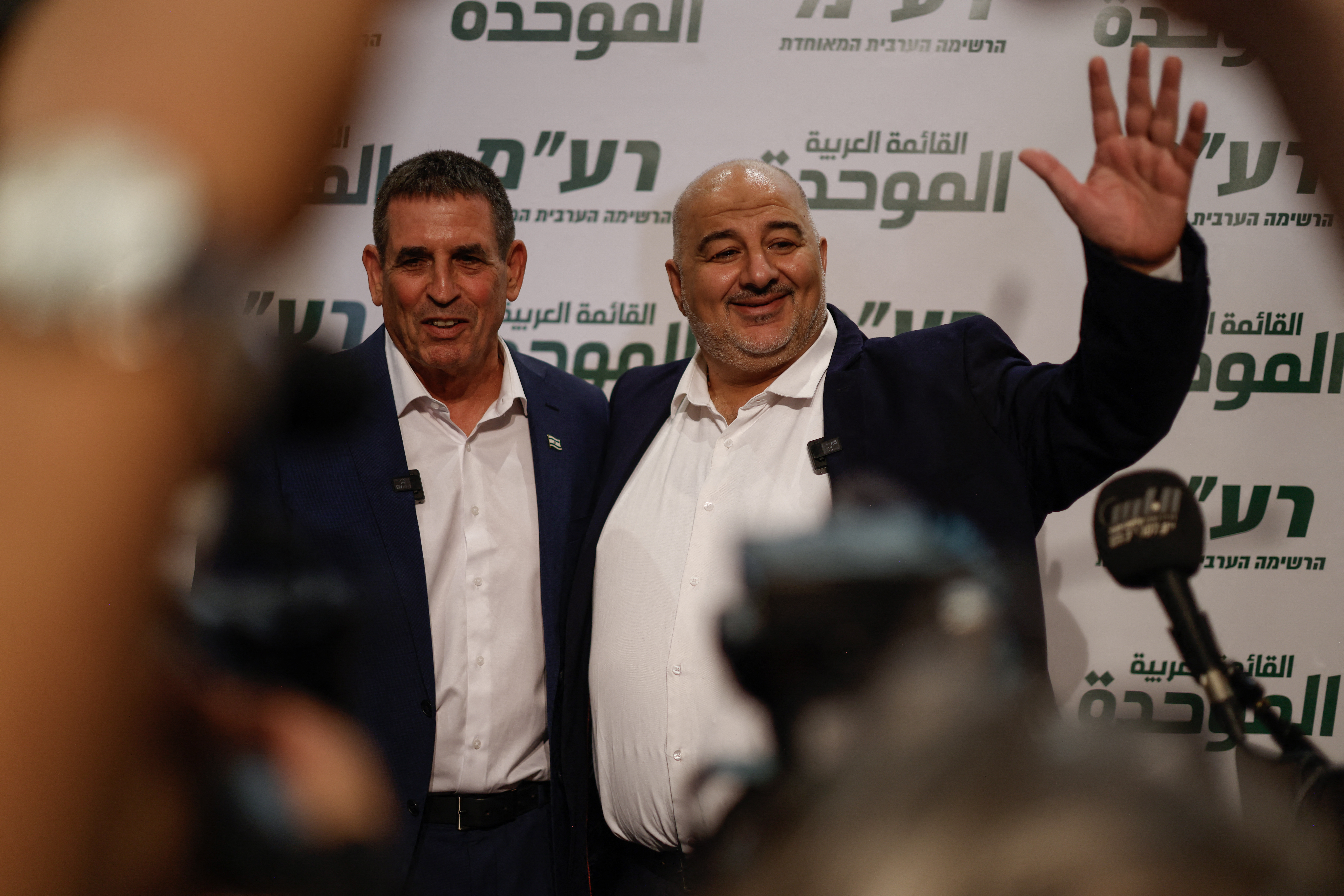 Leader of the Arab Israeli party Ra'am (United Arab List) Mansour Abbas (R) and Israeli politician Yoav Segalovitz (L) attend a news conference in Nazareth on August 31, 2026.