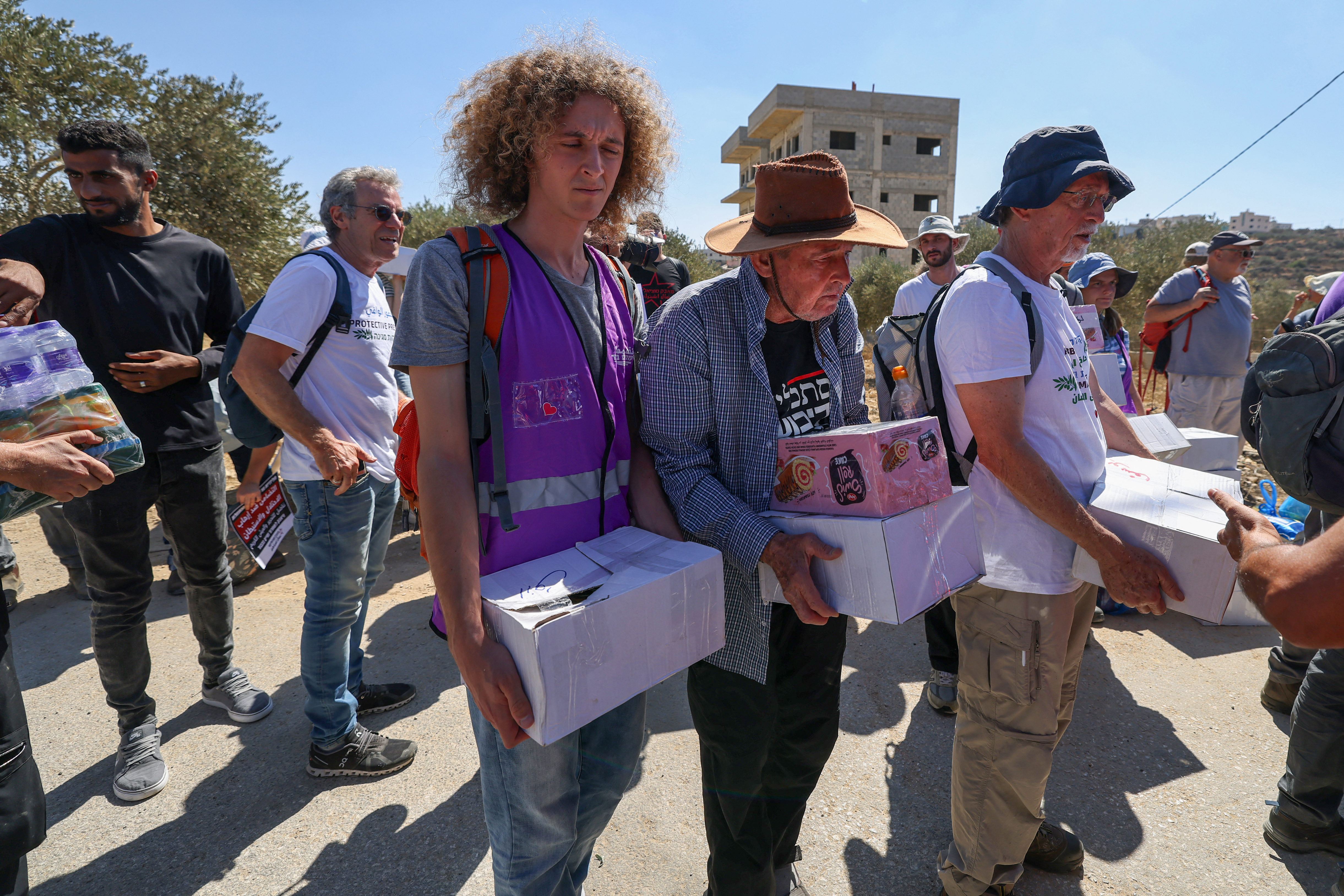 Israeli forces block peace activists carrying food and water from reaching Palestinian families whose homes have been cut off supplies by Israeli settlers in the village of Qusra, south of the city of Nablus in the Israeli-occupied West Bank, on September 4, 2026.
