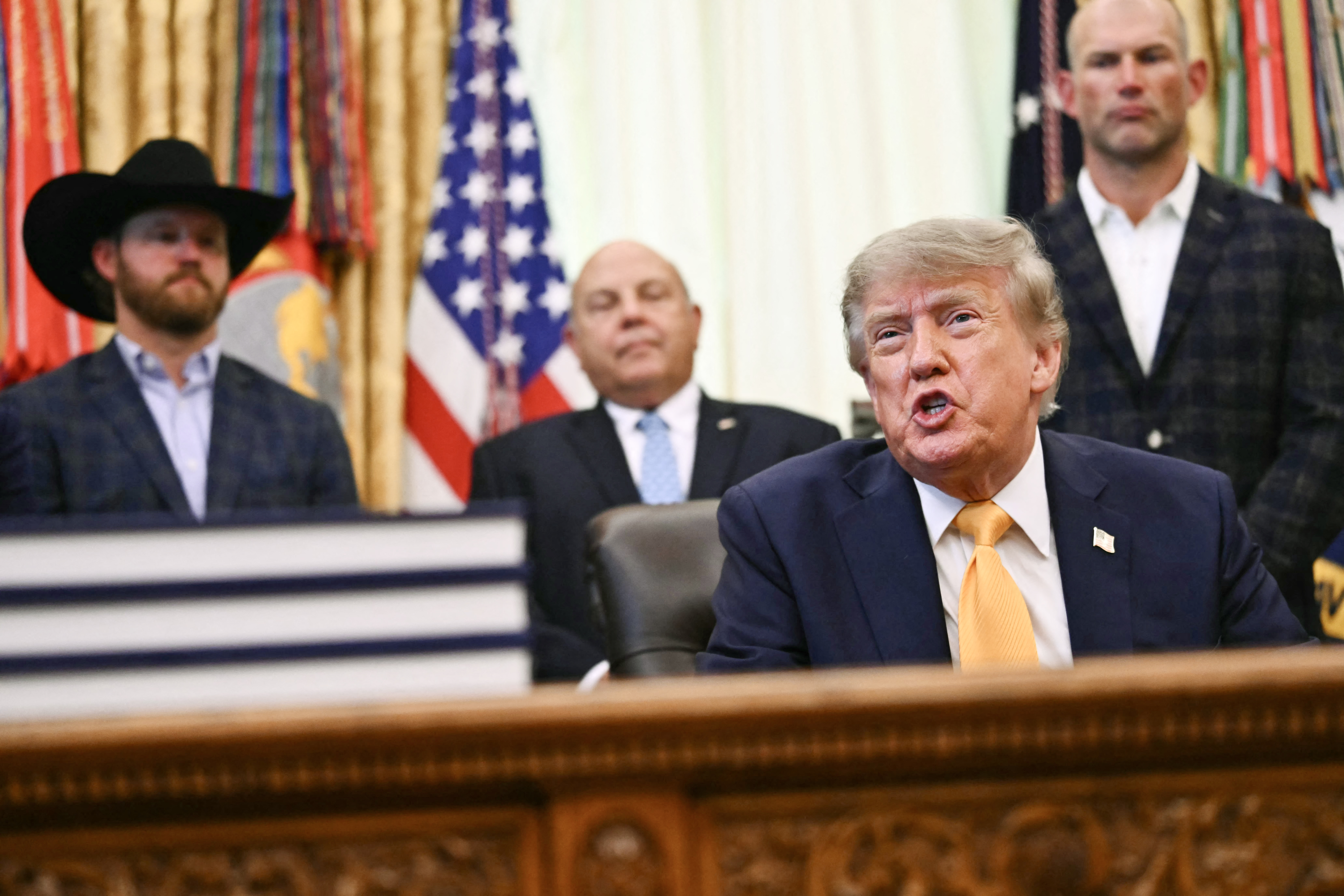 US President Donald Trump speaks before signing executive orders releated to beef processing and cattle ranchers, in the Oval Office of the White House in Washington, DC, on September 4, 2026. (Photo by Kent NISHIMURA / AFP)