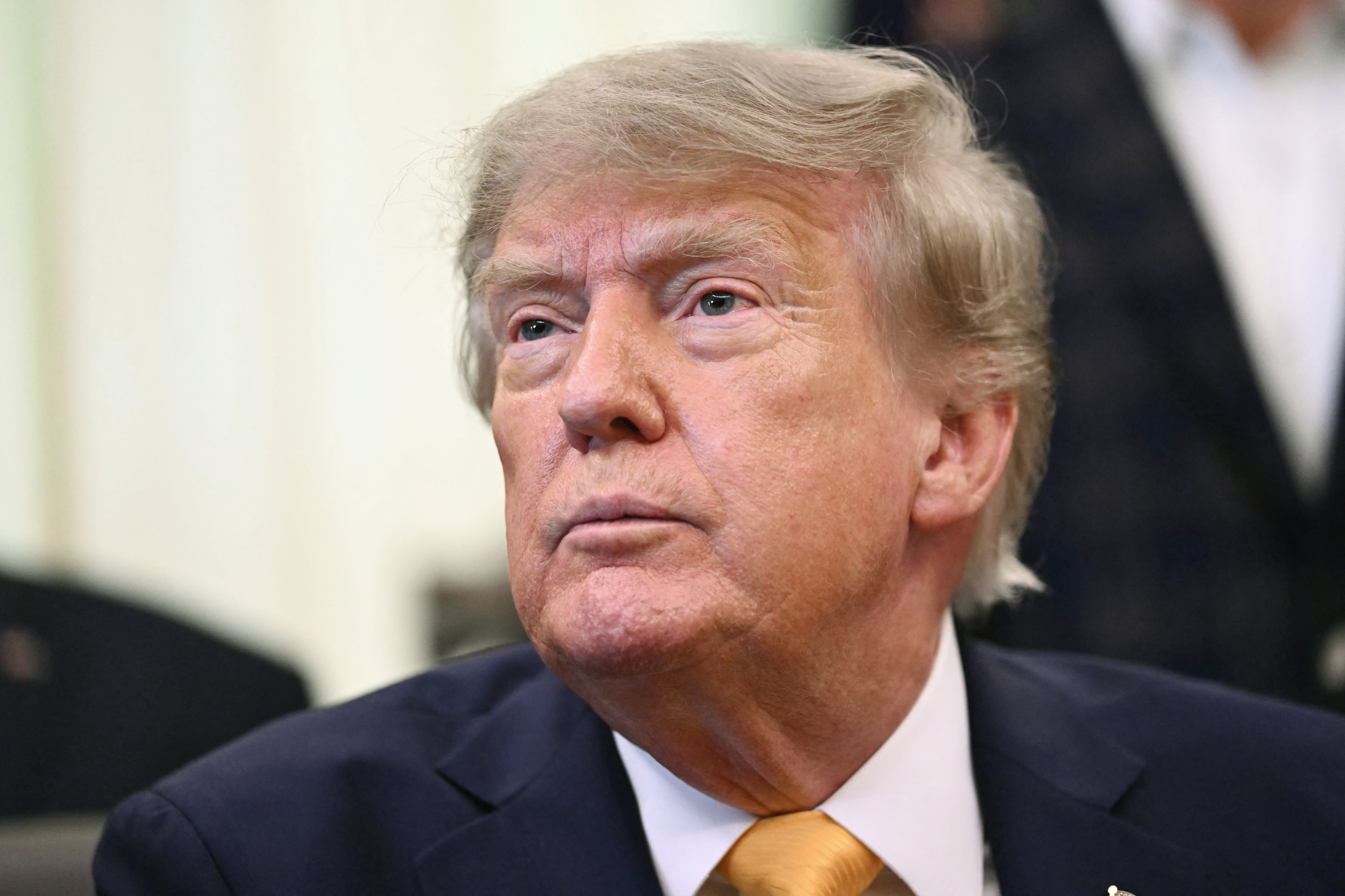 US President Donald Trump looks on before signing executive orders releated to beef processing and cattle ranchers, in the Oval Office of the White House in Washington, DC, on September 4, 2026. (Photo by Kent NISHIMURA / AFP)