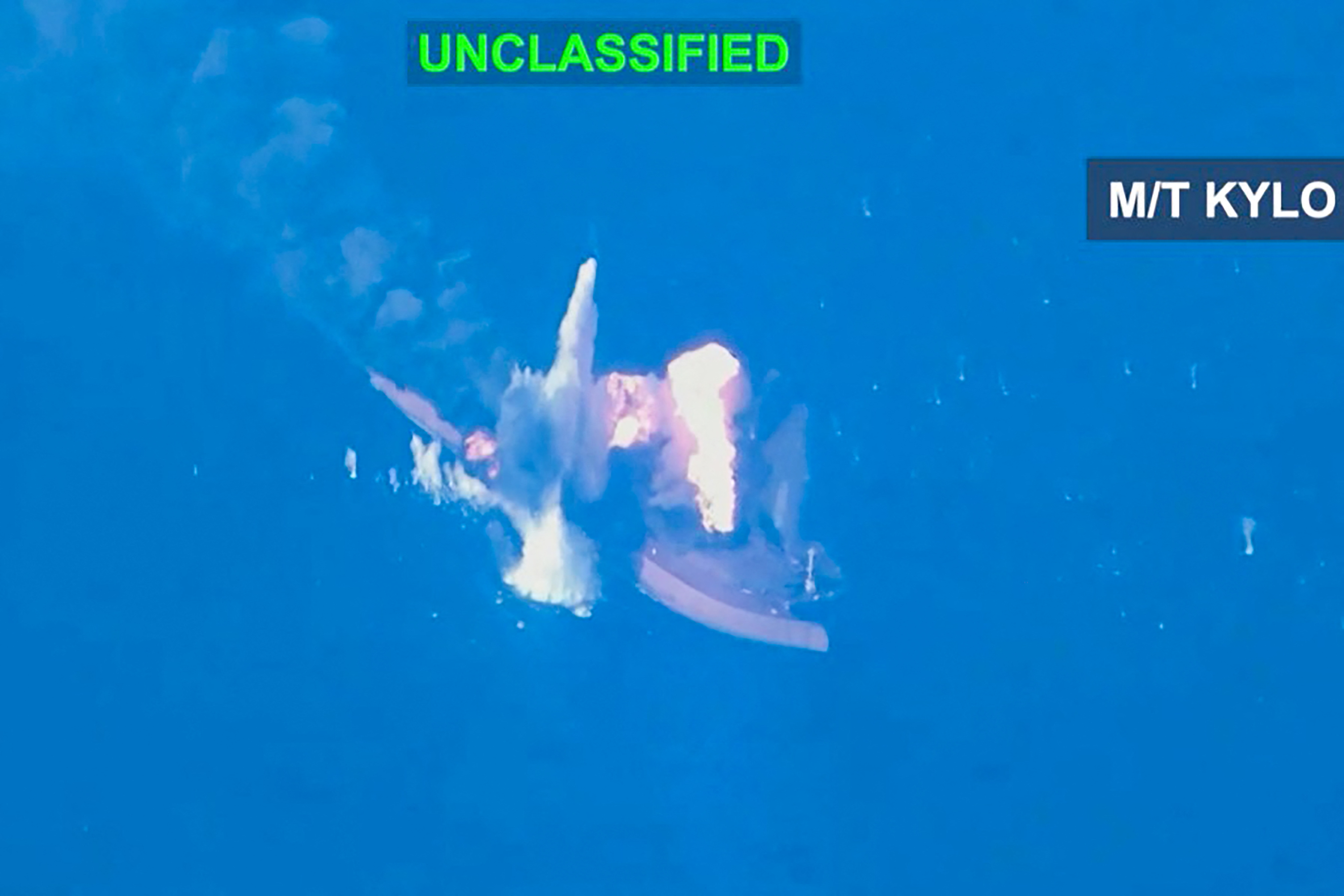 This screen grab from handout video footage released by the US Central Command shows what CENTCOM says are strikes on three oil tankers linked to the IRGC. [AFP]