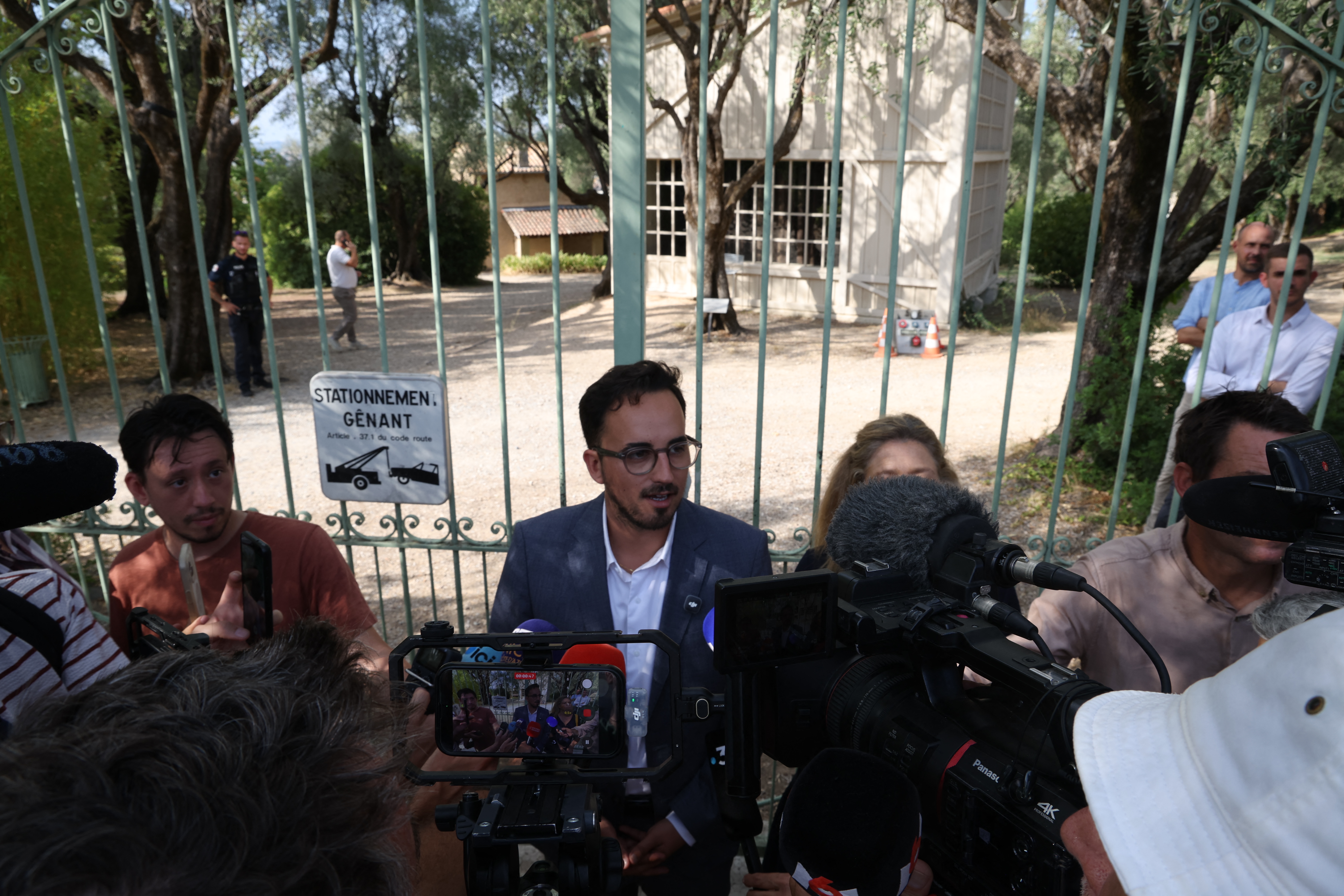 Rassemblement National (RN) Mayor of Cagnes-sur-Mer Bryan Masson makes a statement outside the Musee Renoir after four paintings, together valued at nine million euros, were stolen in an early-morning break-in, with one recovered nearby and two suspects still at large, in Cagnes-sur-Mer on September 8, 2026. (Photo by Valery HACHE / AFP)