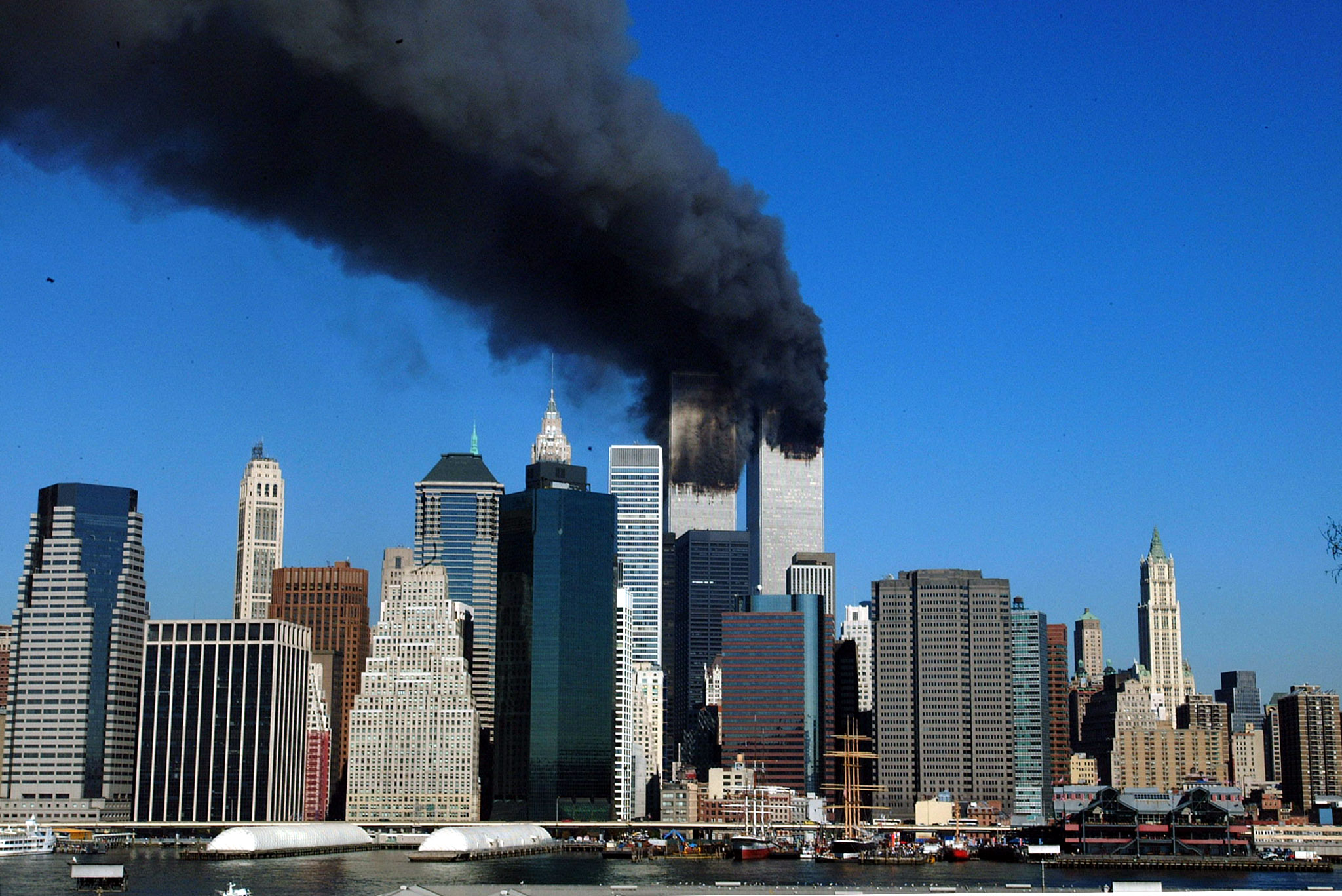 (FILES) The twin towers of the World Trade Center billow smoke after hijacked airliners crashed into them early on September 11, 2001.