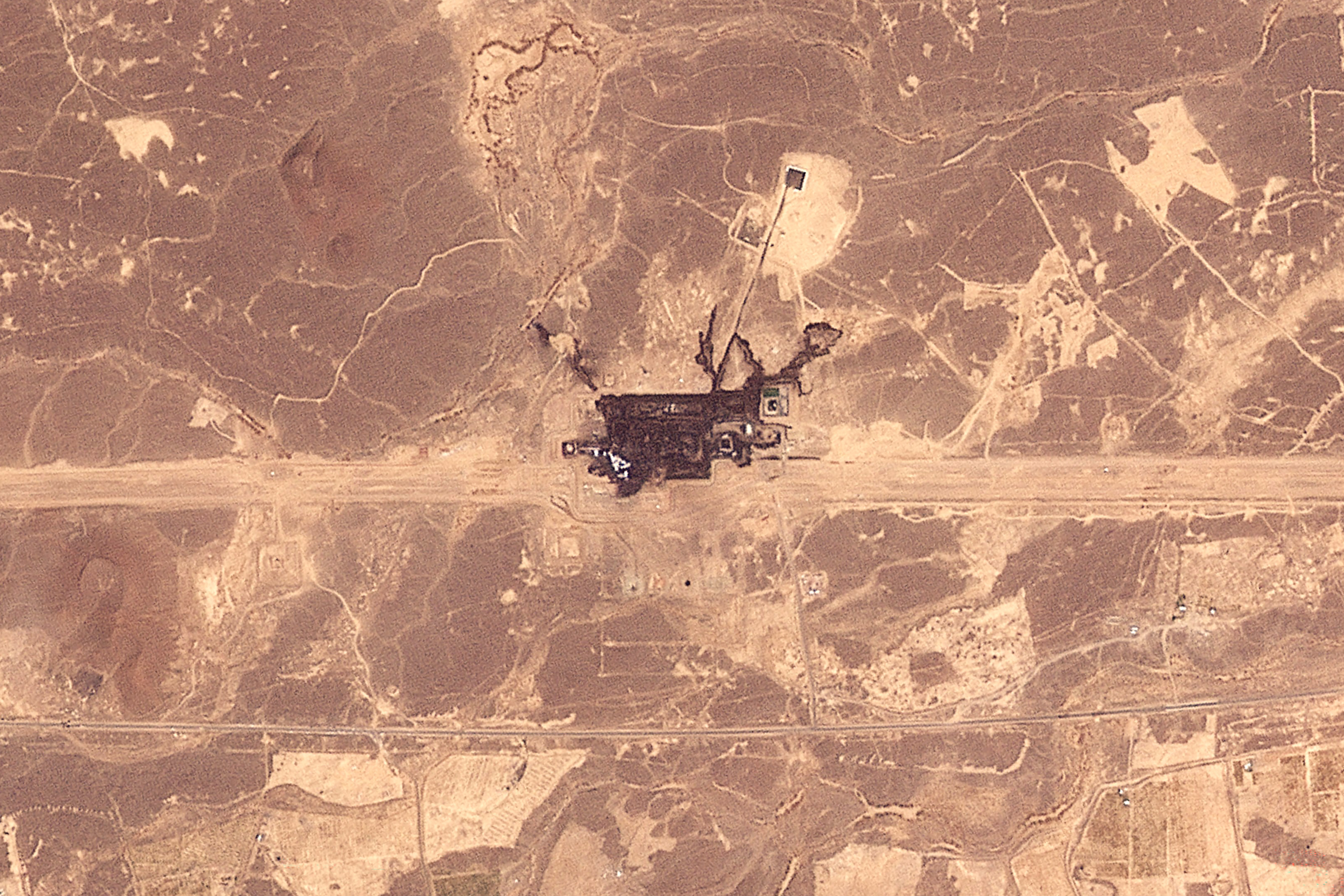 Satellite image showing a general view of an infrastructure site that was damaged by fire along the route of Saudi Arabia's East-West pipeline