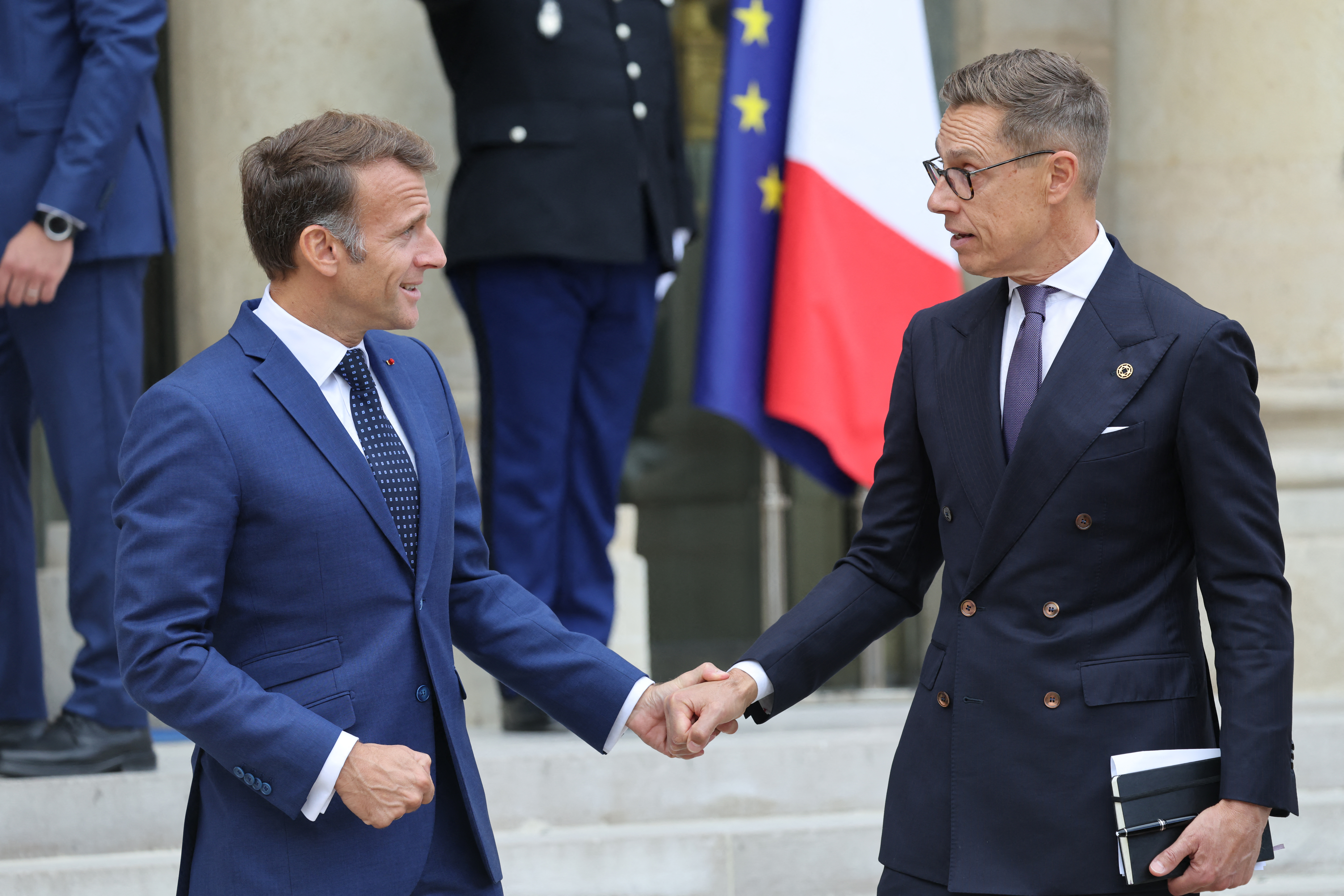 France's President Emmanuel Macron (L) bids farewell to Finland's President Alexander Stubb (R) after their meeting at the Elysee Palace in Paris on September 10, 2026. (Photo by Ludovic MARIN / AFP)