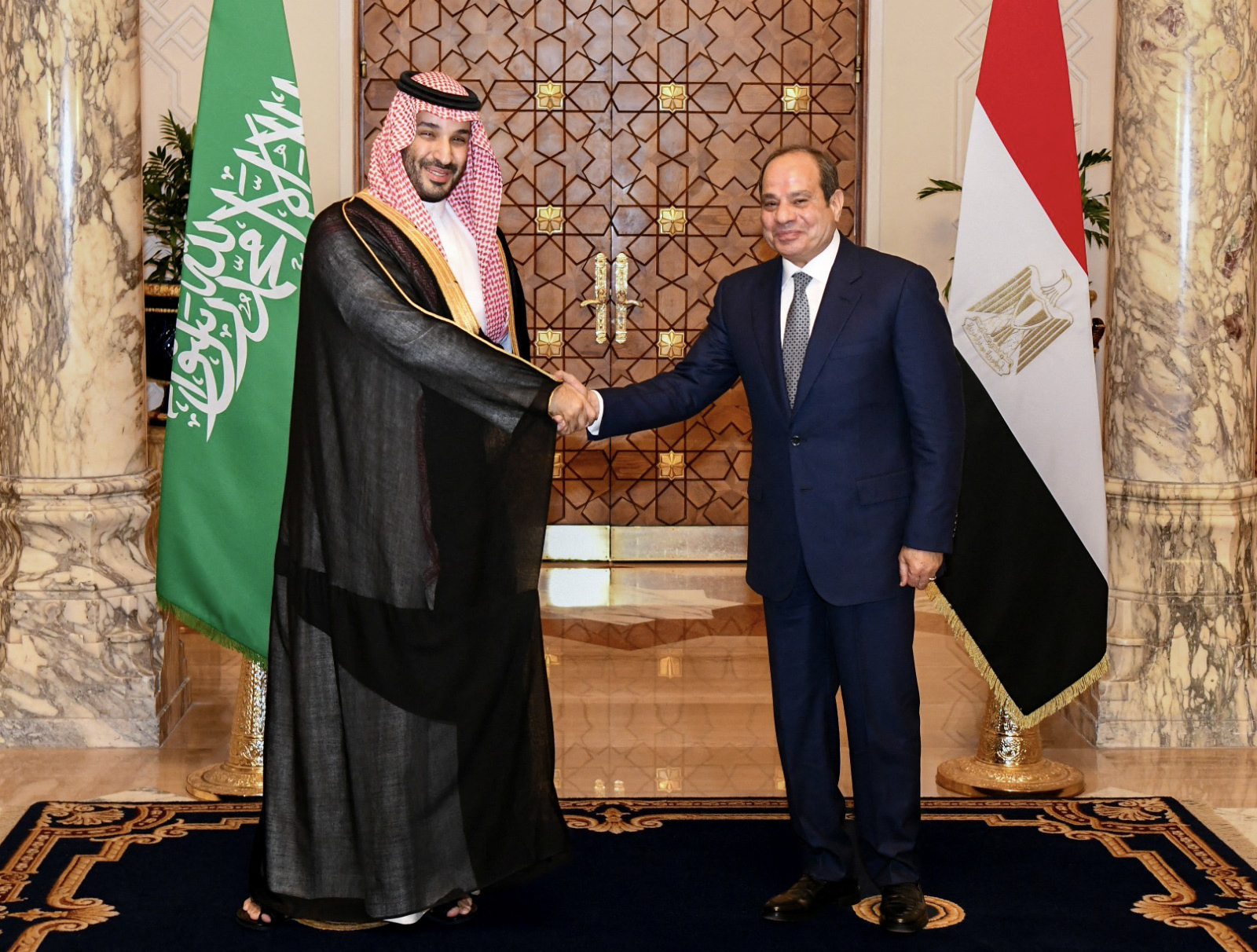 This handout photograph released by the Egyptian Presidency on September 15, 2026, shows Saudi Crown Prince Mohammed bin Salman (L) checking hands with Egypt's President Abdel Fattah al-Sisi during a meeting in Cairo.