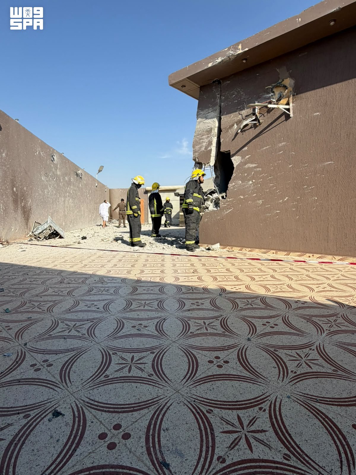 A handout picture provided by the Saudi Press Agency (SPA) on September 17, 2026, shows emergency personnel assessing damage following a reported Houthi drone attack over Taif.