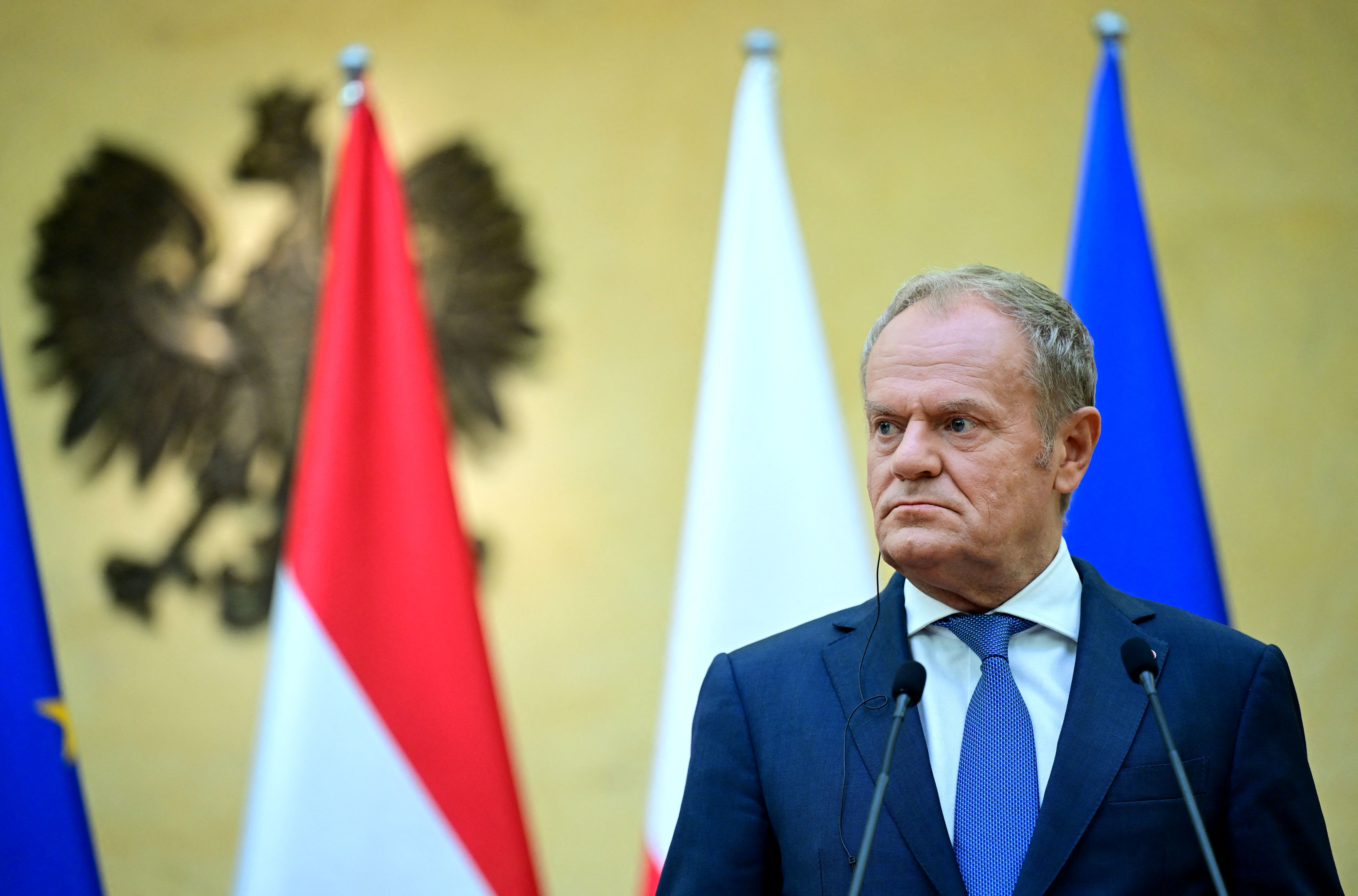 Polish Prime Minister Donald Tusk looks on during a joint press conference with the Austrian Chancellor in Warsaw on September 17, 2026. (Photo by ROLAND SCHLAGER / APA / AFP) / AUSTRIA OUT