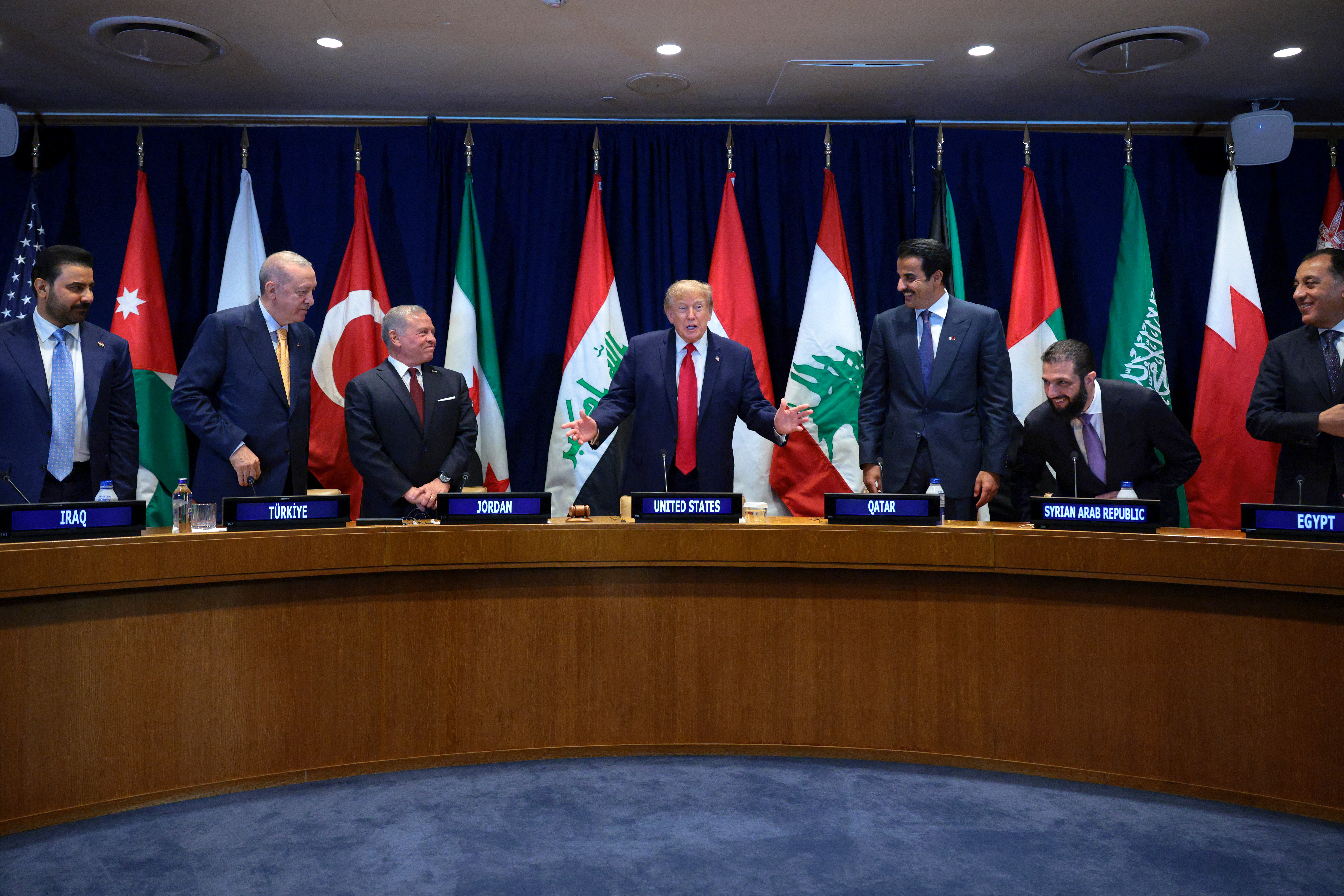 NEW YORK, NEW YORK - SEPTEMBER 22: (L-R) Prime Minister of Iraq Ali al-Zaidi, President of Turkey Recep Tayyip Erdoğa, King Abdullah II of Jordan, U.S. President Donald Trump, Qatari Emir Sheikh Tamim bin Hamad Al Thani, President of the Syrian Arab Republic is Ahmad al-Sharaa, and Prime Minister of Egypt is Mostafa Madbouly attend a multilateral meeting of the Gulf Cooperation Council during the 81st session of the United Nations (U.N.) General Assembly at U.N. Headquarters on September 22, 2026 in New York City. World leaders have gathered in New York for the annual session of the United Nations General Assembly, with this year's global issues ranging from the threat of artificial intelligence to the continued wars in Ukraine and Gaza. Chip Somodevilla/Getty Images/AFP (Photo by CHIP SOMODEVILLA / GETTY IMAGES NORTH AMERICA / Getty Images via AFP)