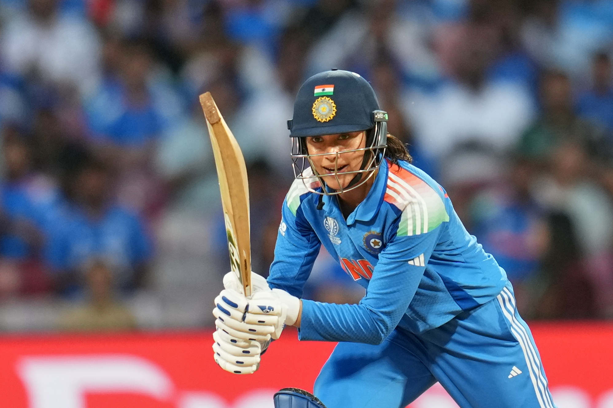 India's Smriti Mandhana plays a shot during the ICC Women's Cricket World Cup final match between India and South Africa in Navi Mumbai, India, Sunday, Nov. 2, 2025. (AP Photo/Rafiq Maqbool)