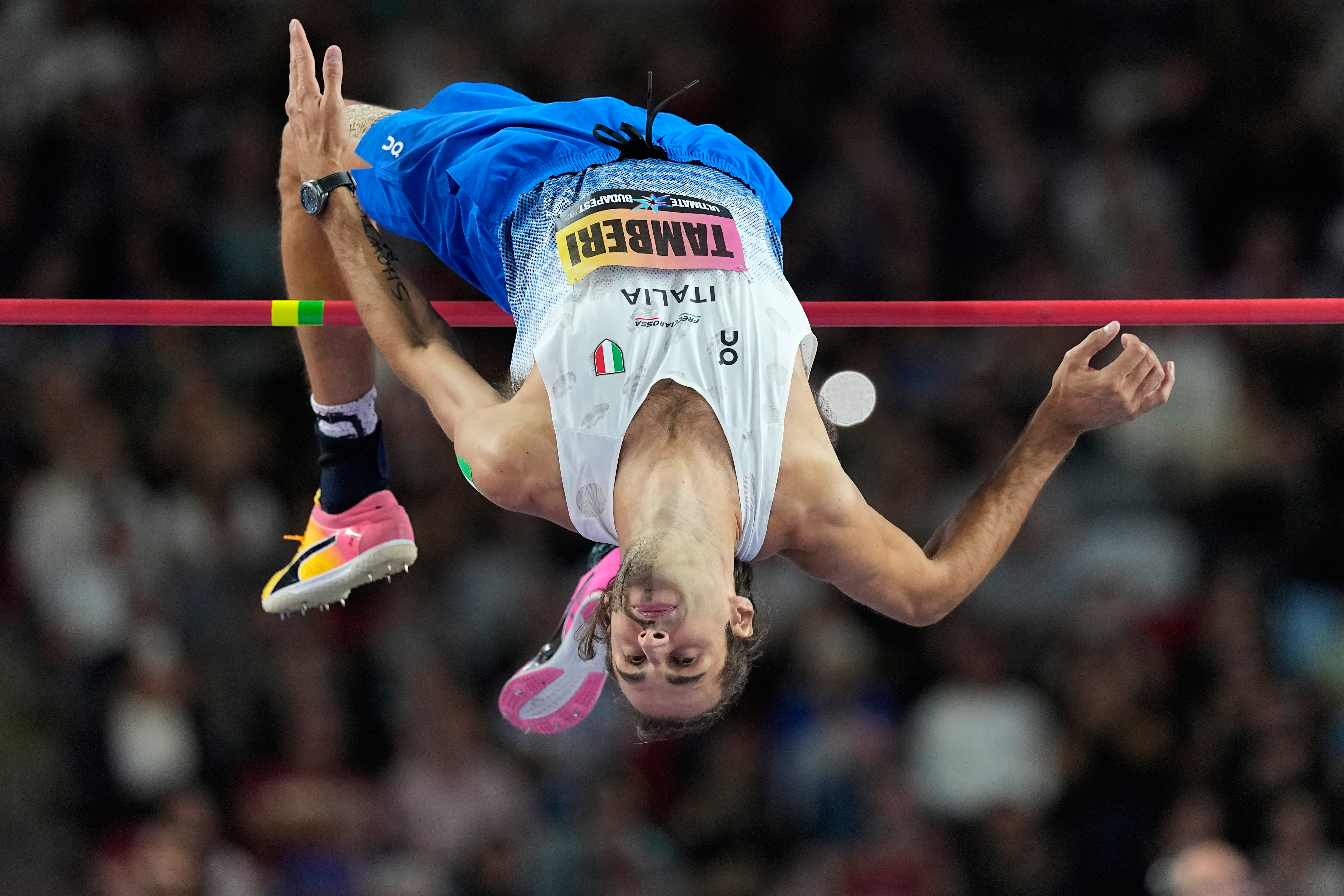 Gianmarco Tamberi, of Italy, makes an attempt in the men's high jump final at the World Athletics Ultimate Championship in Budapest, Hungary, Sunday, Sept. 13, 2026. (AP Photo/Matthias Schrader)