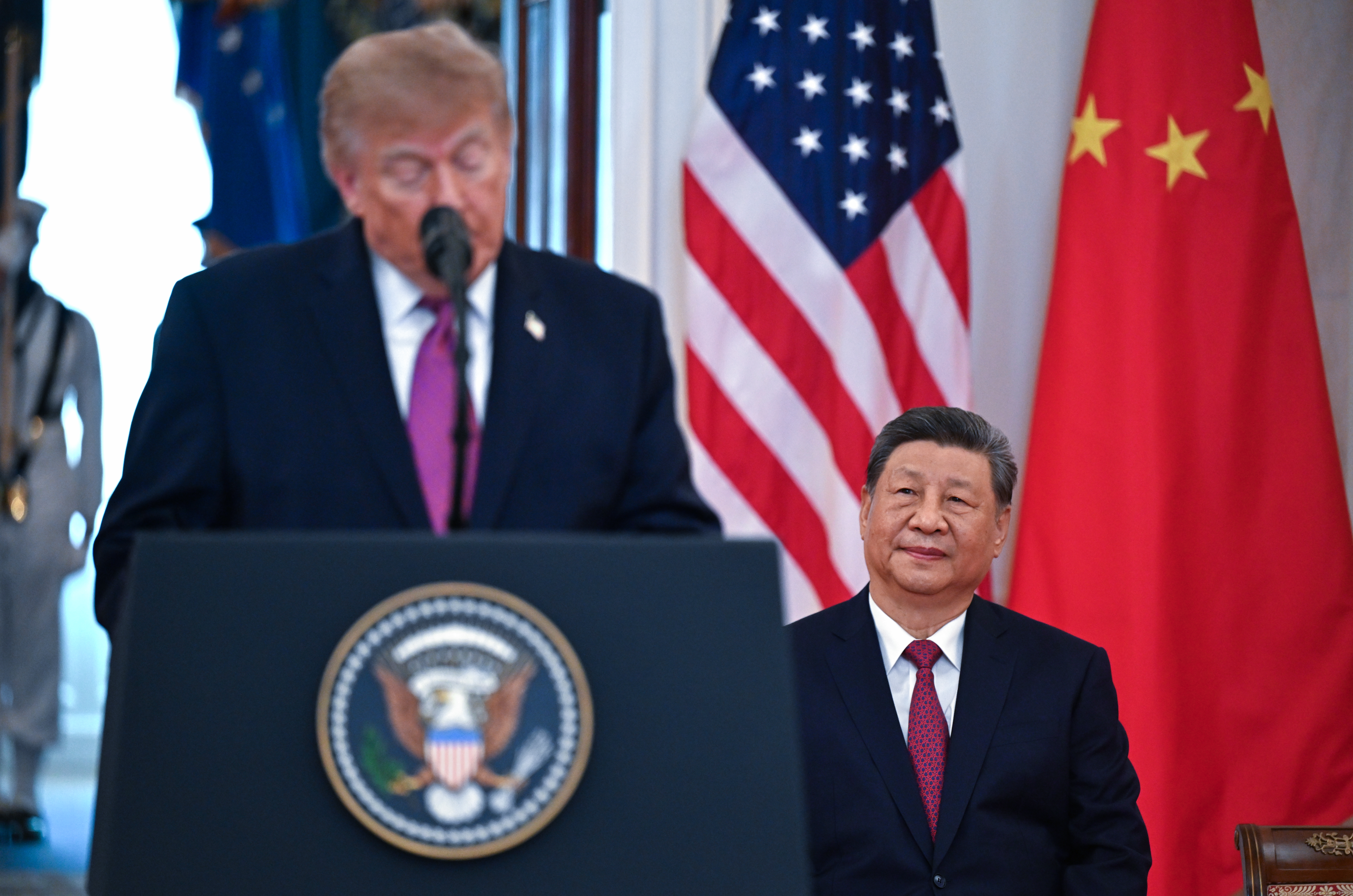 epa13260352 China's President Xi Jinping (R) looks on as United States President Donald J. Trump (L) makes remarks during an Arrival Ceremony for a State Visit in the Cross Hall of the White House in Washington, DC, USA, 24 September 2026. President Xi is on a three-day state visit, marking his first trip to DC in 11 years. EPA/Annabelle Gordon / POOL