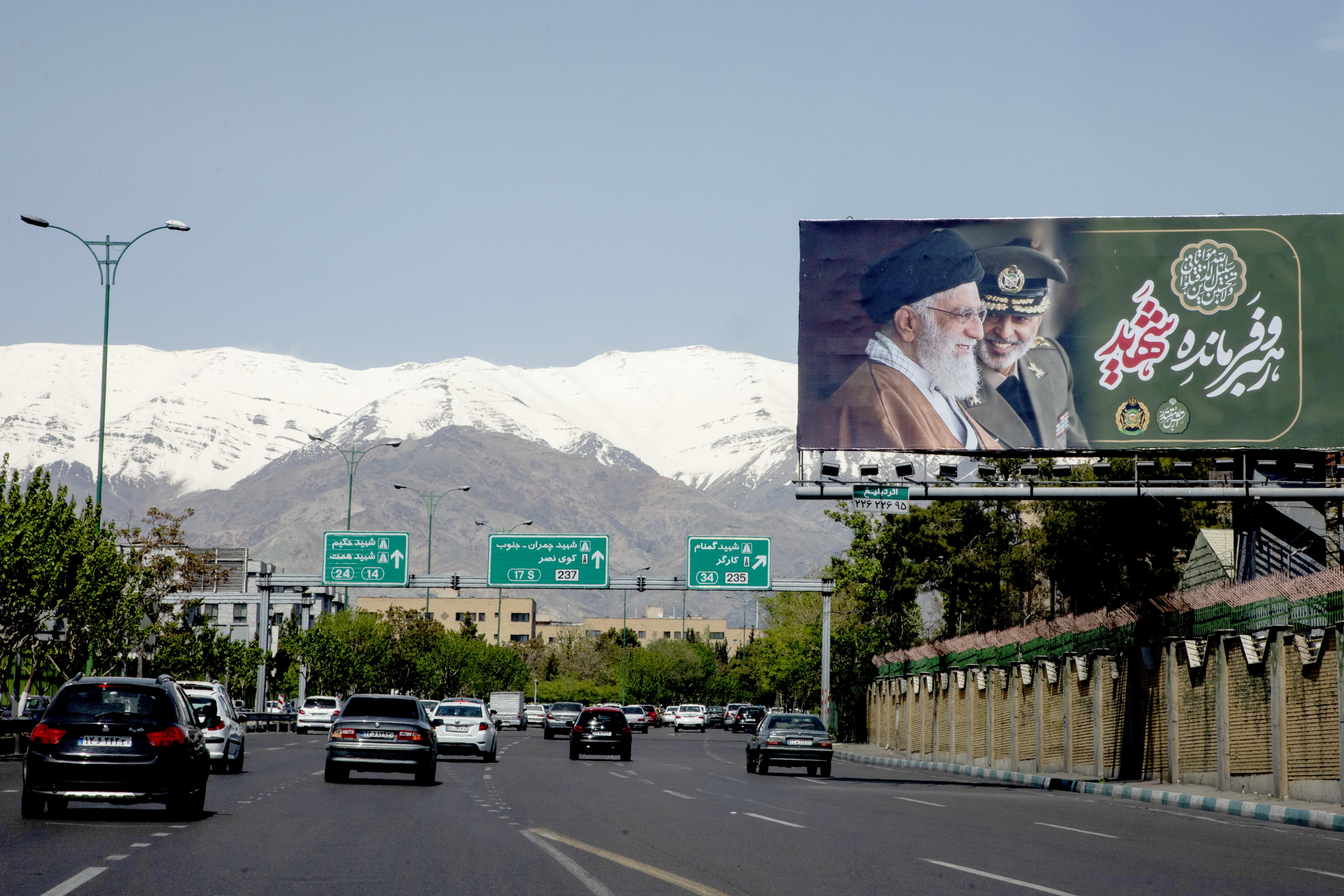 TEHRAN, IRAN - APRIL 14: A billboard featuring a portrait of the slain former Iranian leader, Ayatollah Ali Khamenei, left, is displayed on the side of a motorway on April 14, 2026 in Tehran, Iran. On April 8 President Donald Trump announced a two-week ceasefire between the US and Iran. Peace talks facilitated by Pakistan have since stalled, reportedly over Iran's nuclear capabilities and control of the Strait of Hormuz. (Photo by Majid Saeedi/Getty Images)