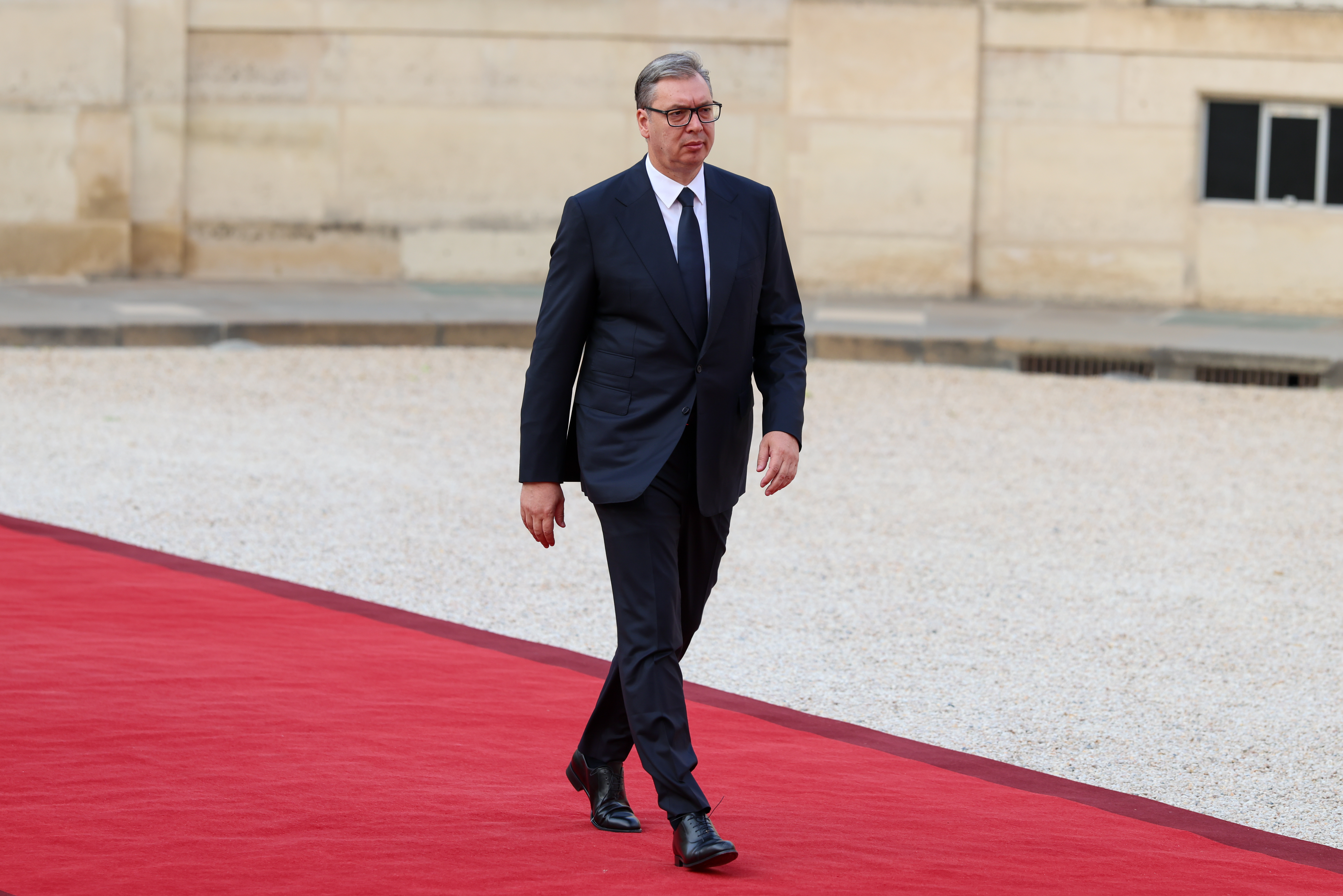 PARIS, FRANCE - JULY 13: Serbian President Aleksandar Vucic arrives for a dinner during a "Coalition of the Willing" meeting at Elysee Palace on July 13, 2026 in Paris, France. France's President hosted the state dinner, which involved heads of state and government from Ukraine and nine European countries, on the eve of the July 14 Bastille Day military parade. (Photo by Pierre Suu/Getty Images)